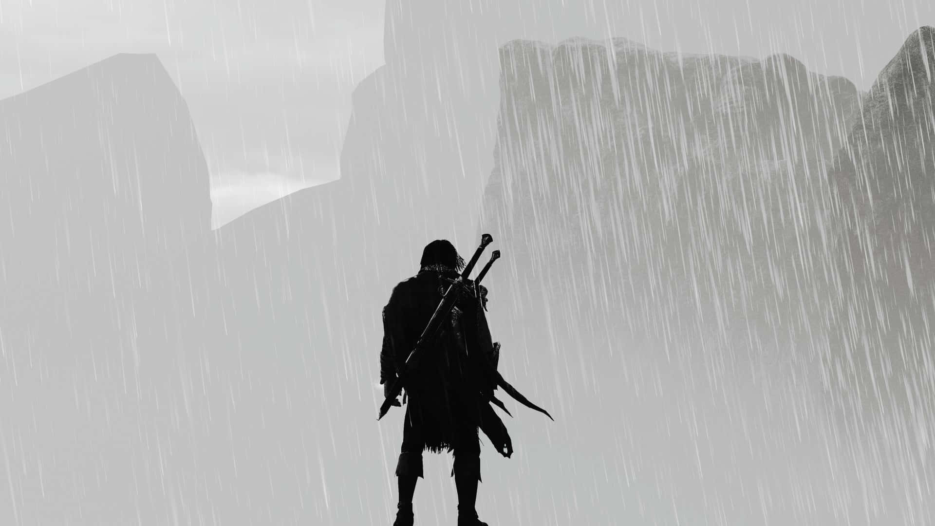 A Silhouette Of A Man Standing In The Rain