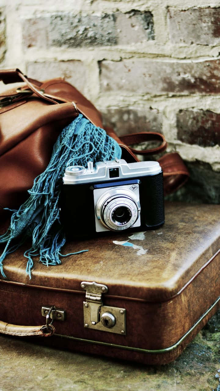 720p Travel Background Vintage Camera And Leather Bag Background