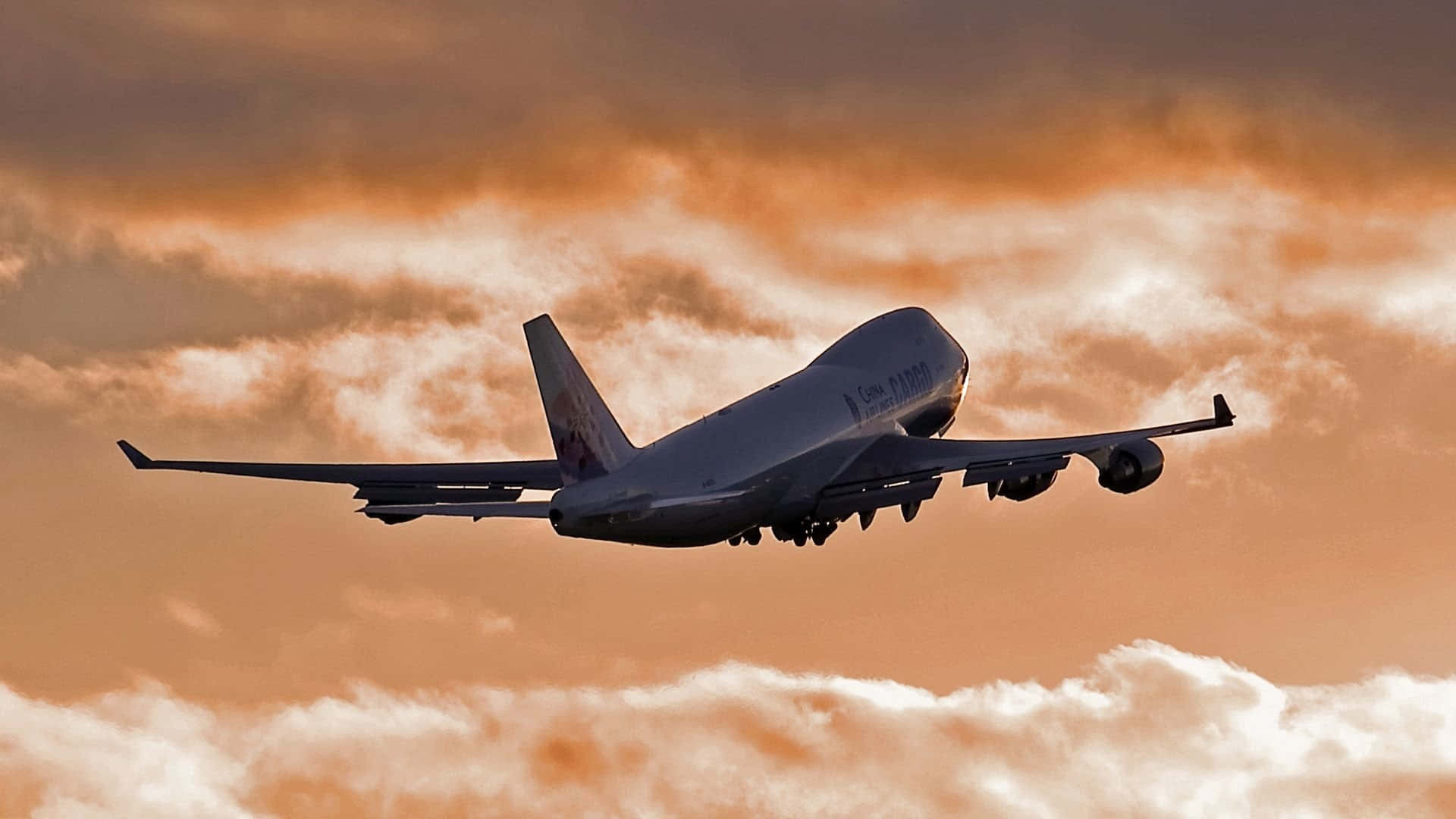 Klättraombord På En Klassisk: En Boeing 747-flygplan I Flygning. Wallpaper