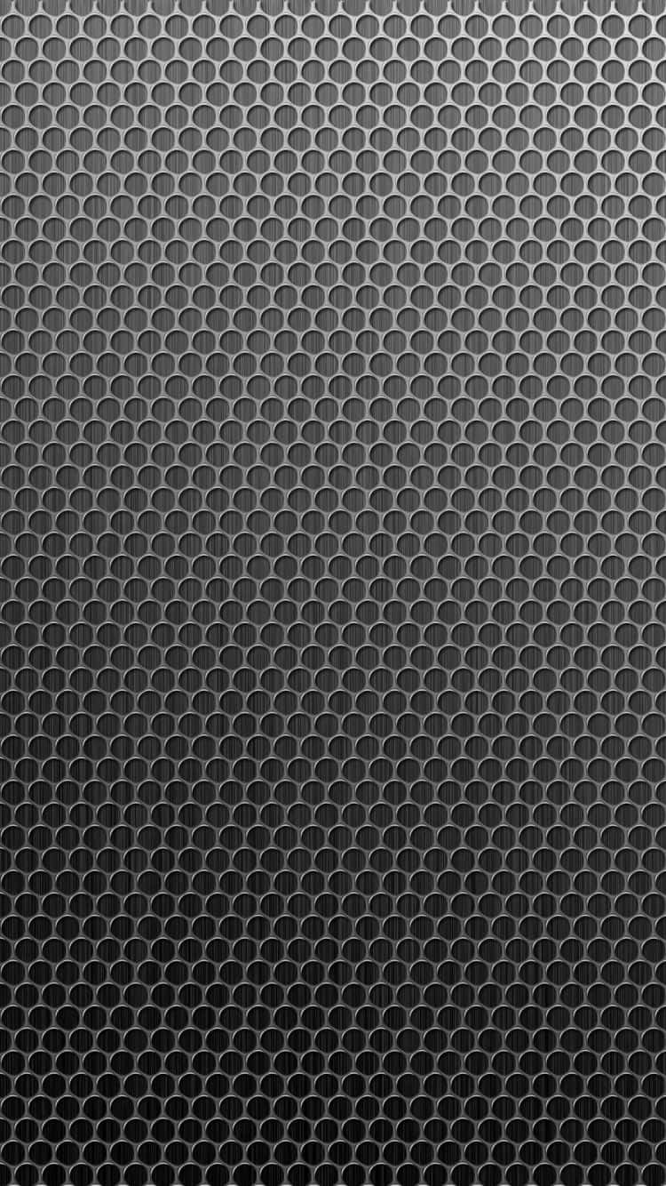 A Black And White Metal Mesh Background Wallpaper