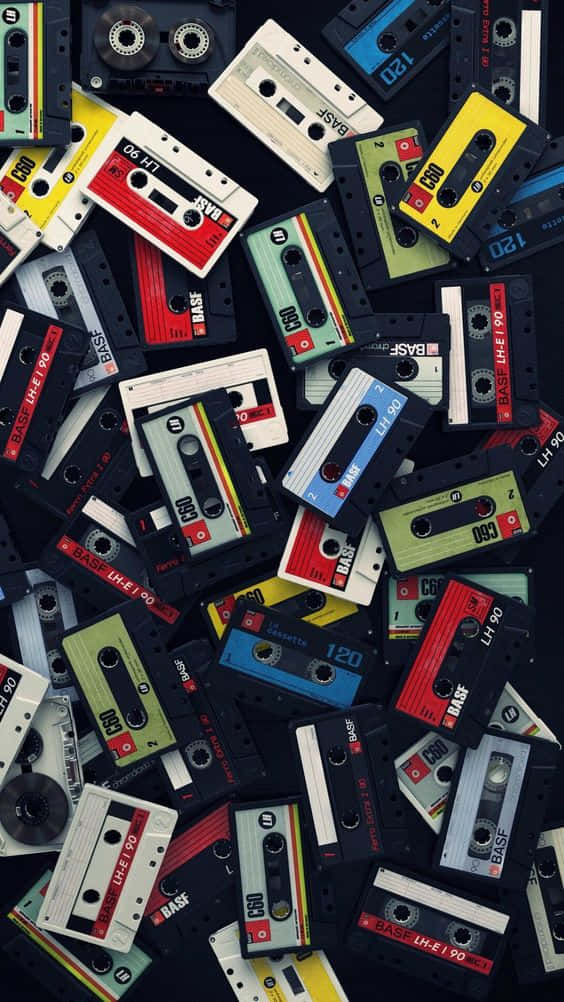 Casetesde Cassette De Los Años 80 Para Iphone. Fondo de pantalla