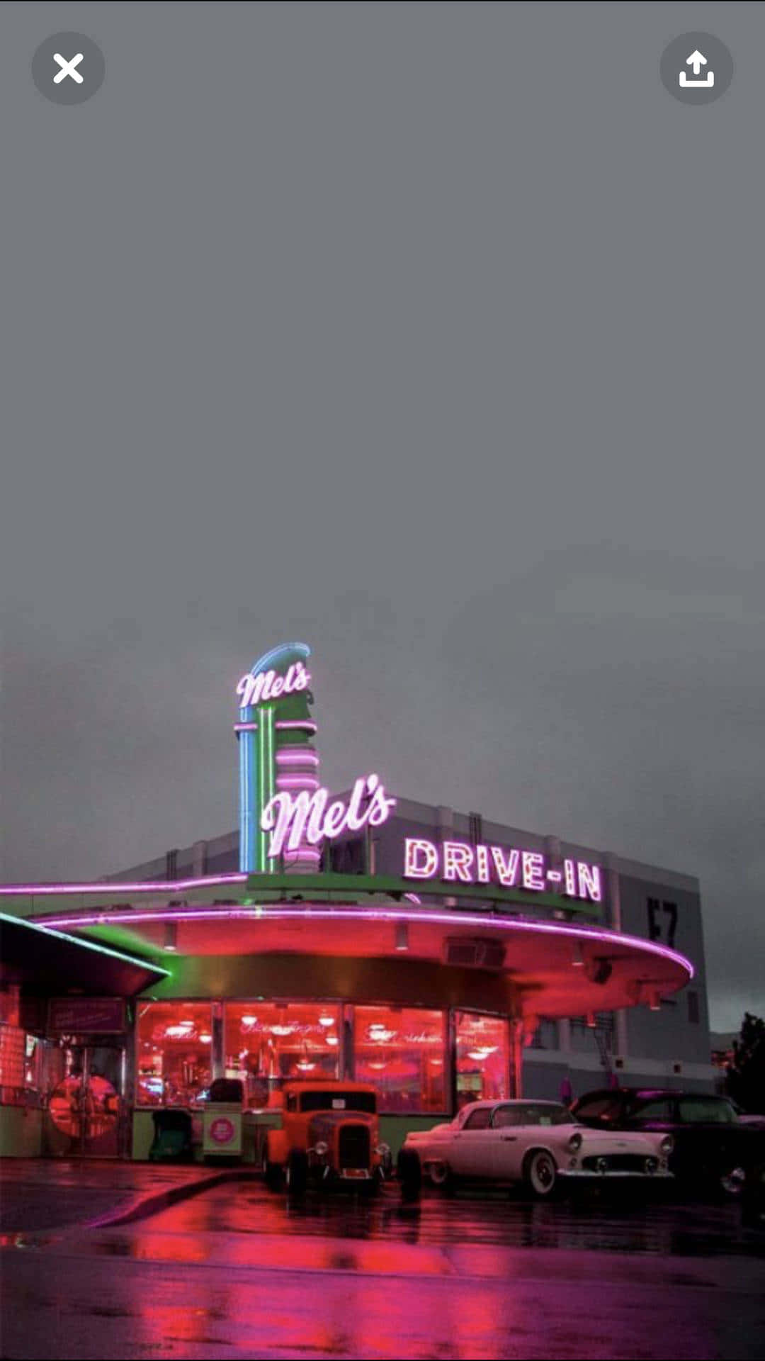 A Neon Sign With A Neon Sign Wallpaper