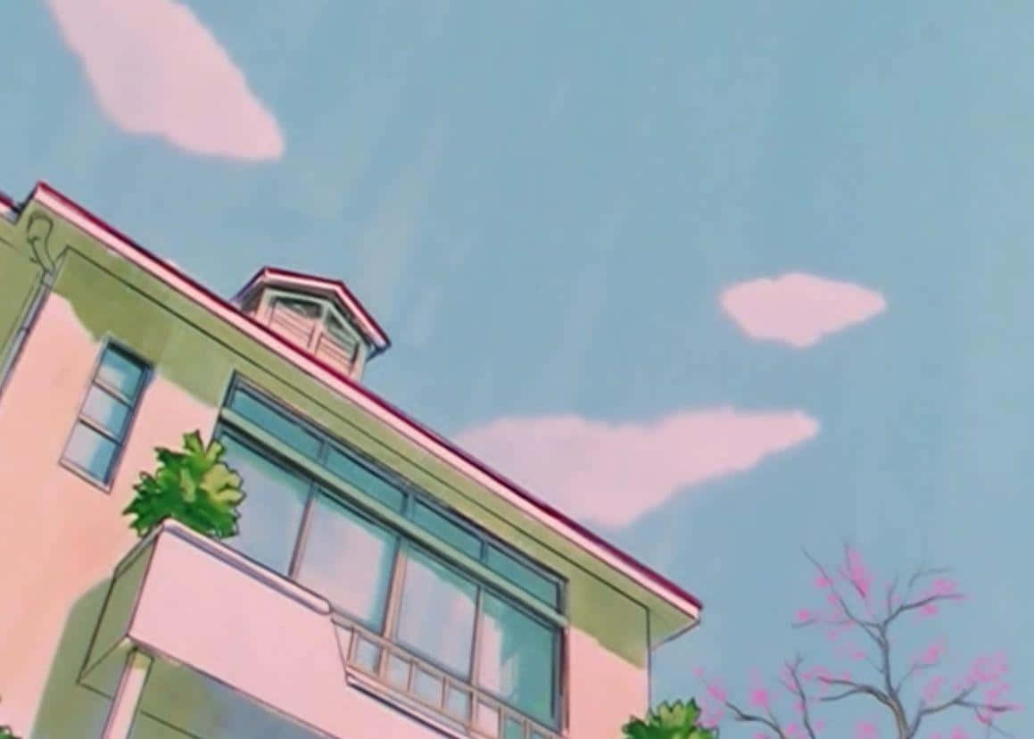 A House With A Pink Roof And A Blue Sky Wallpaper