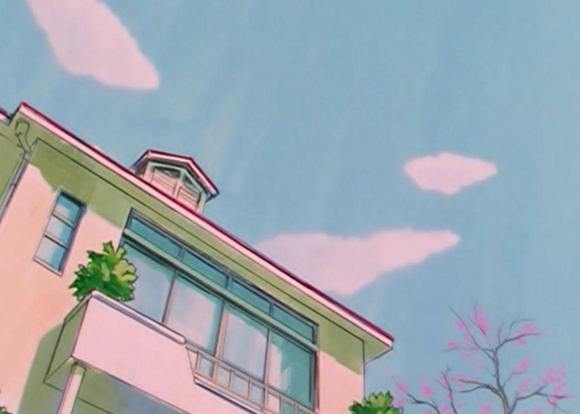 Einhaus Mit Einem Rosa Dach Und Einem Blauen Himmel. Wallpaper