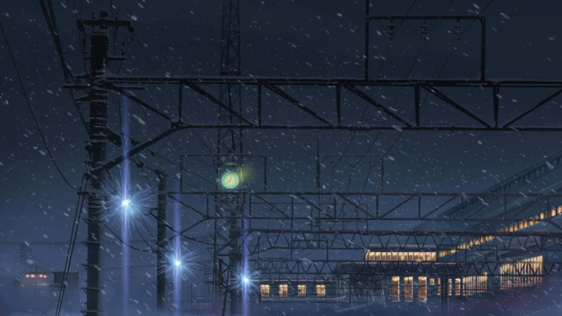 A Train Station With Lights And Power Lines Wallpaper