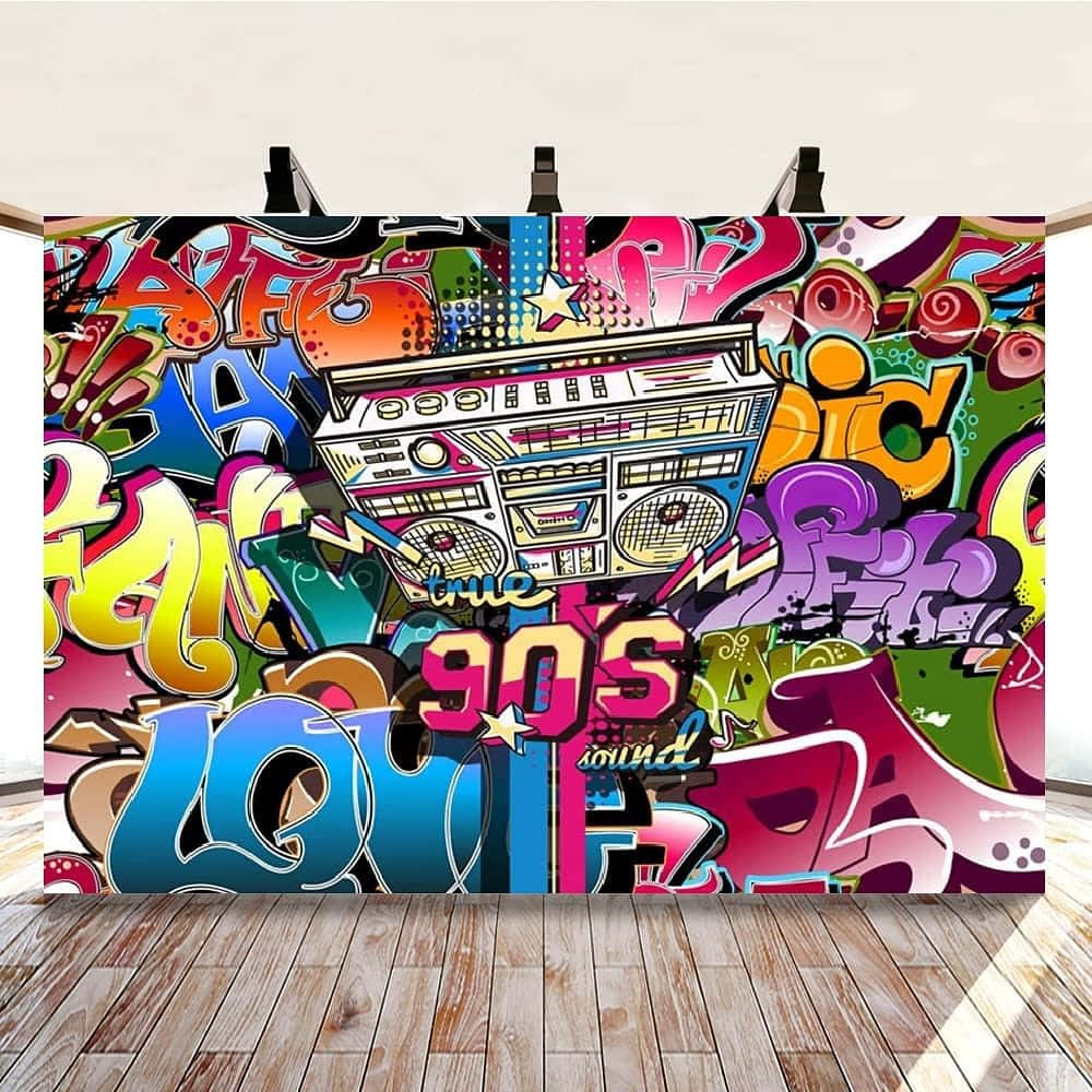 A Graffiti Wall With A Boombox And Graffiti