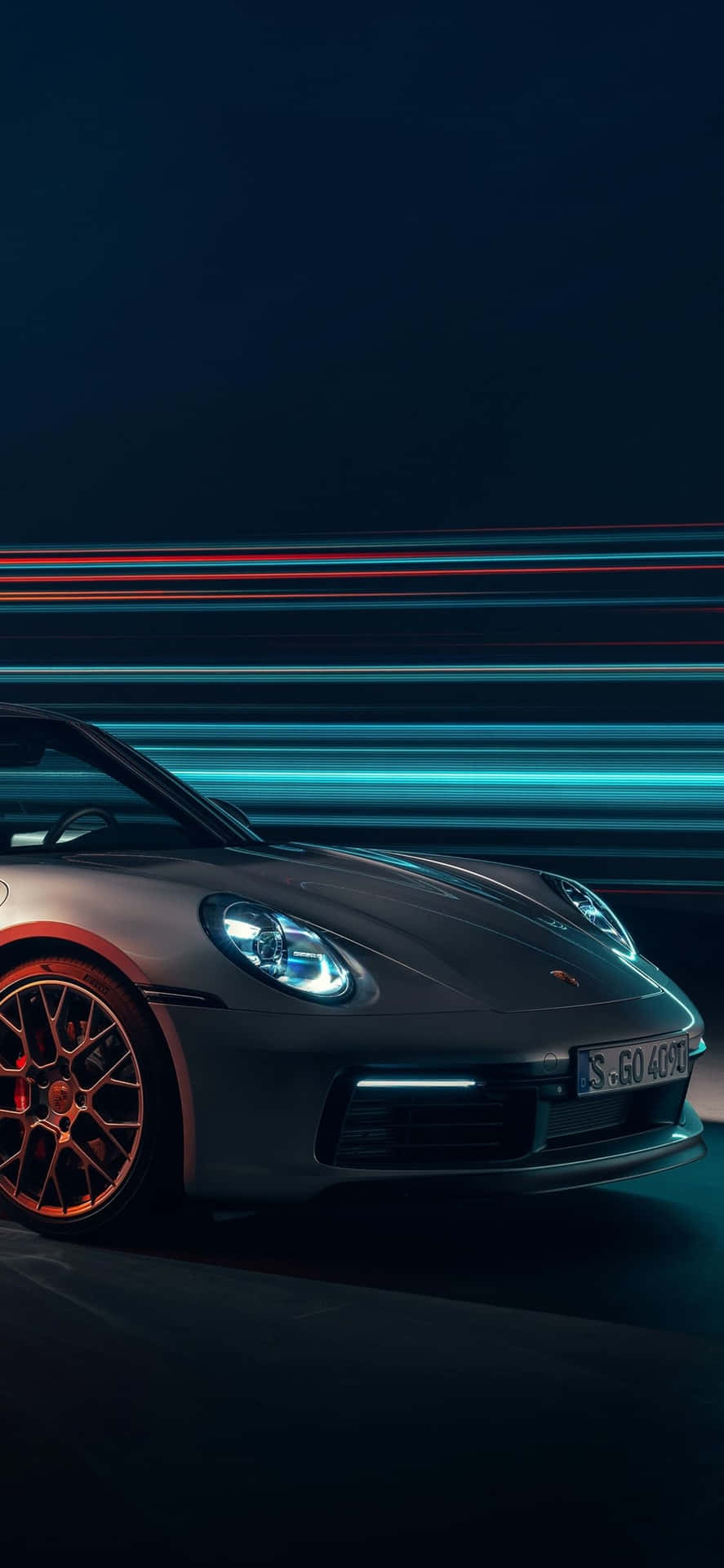 Porsche 911 GTS - En ny bil med et rødt strik på stødfangeren Wallpaper