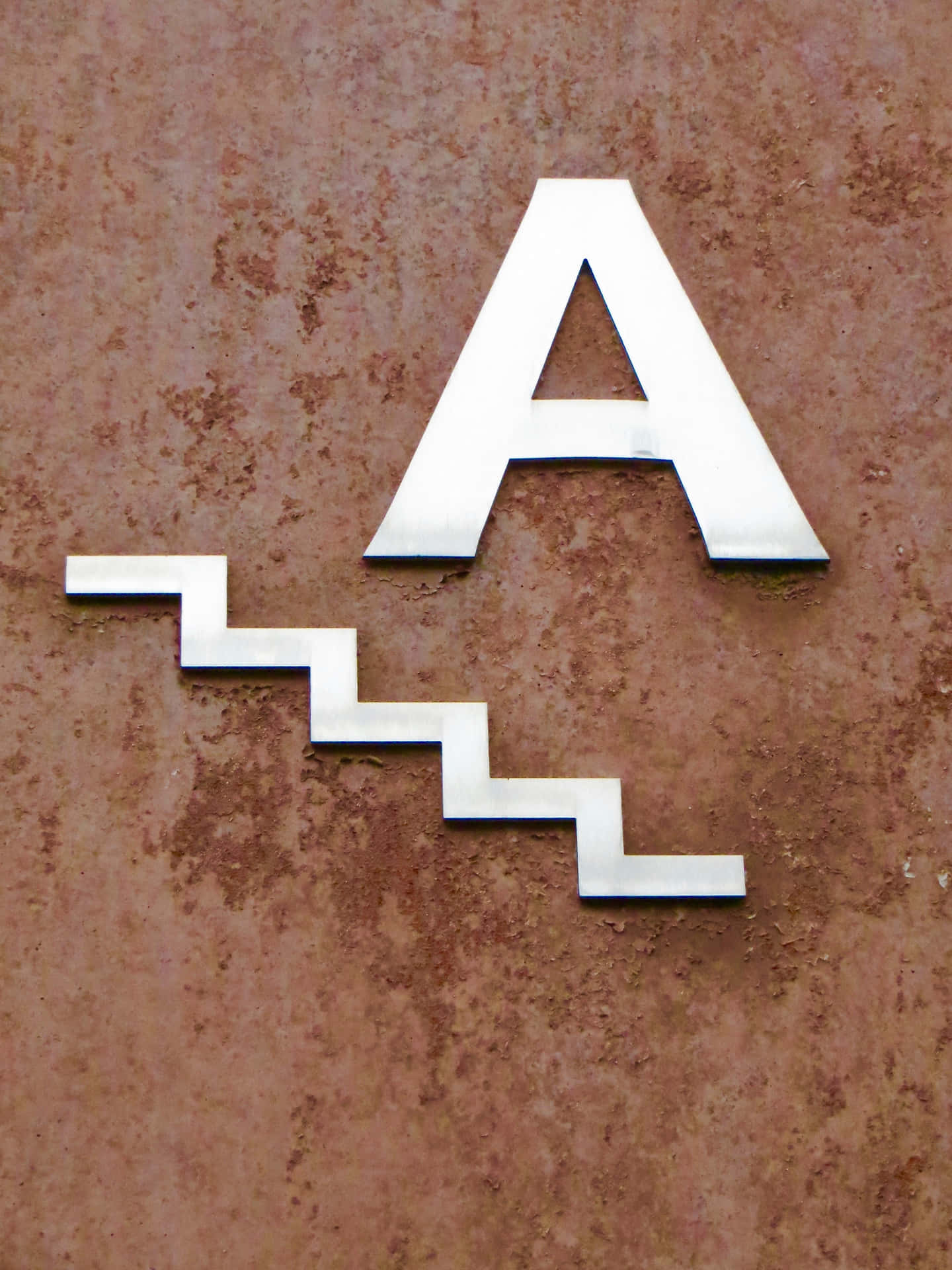 Hemdekorationbokstaven A-bakgrund.