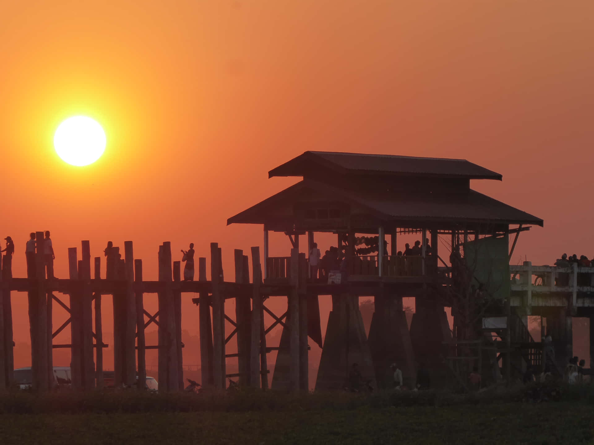 A Beautiful Sunset At The U Bein Bridge Near Mandalay. Wallpaper