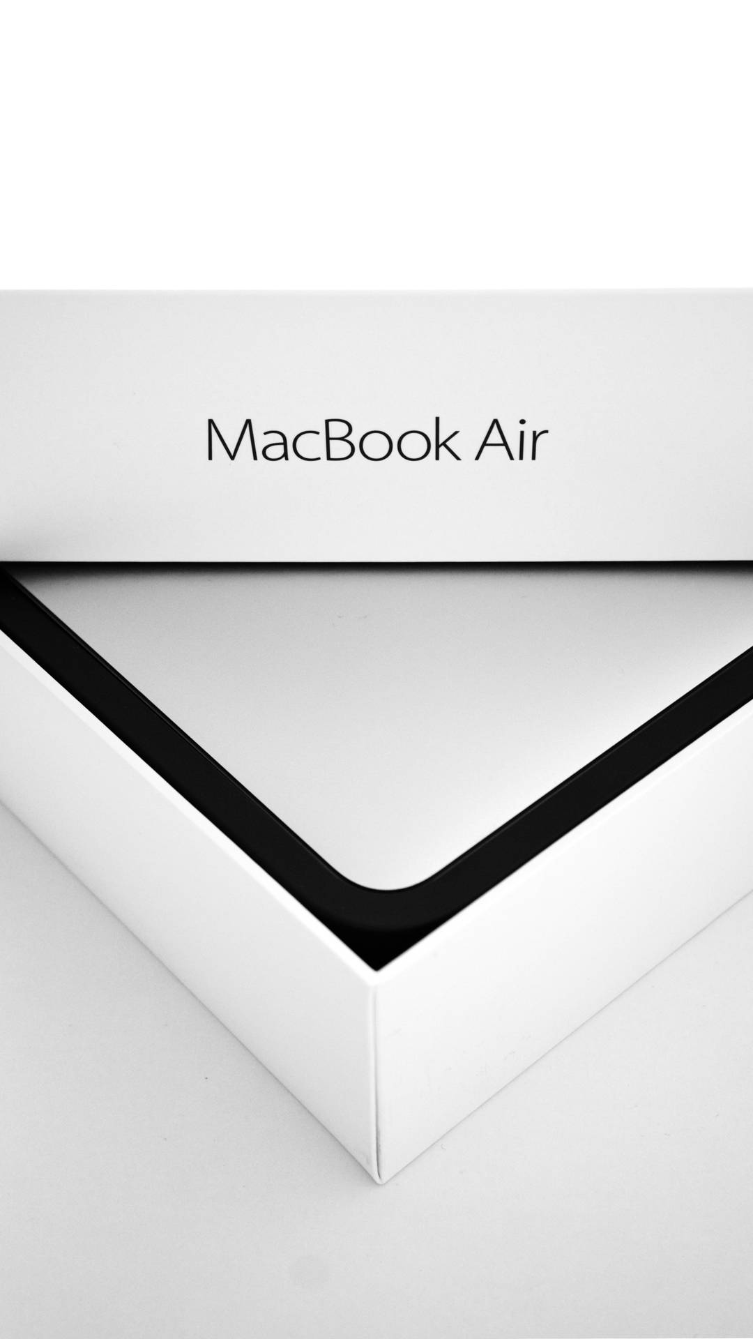 Enlåda Med En Macbook Air 2020. Wallpaper