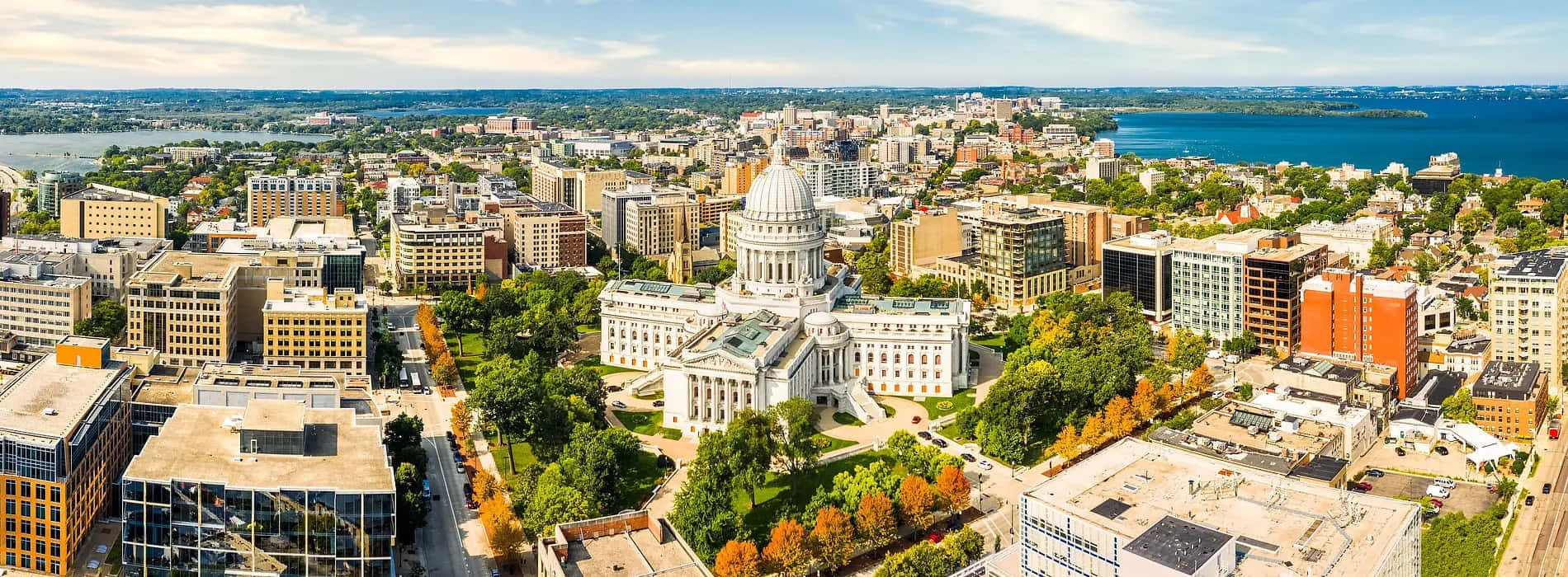 A Breathtaking View Of Madison Skyline At Sunset Wallpaper