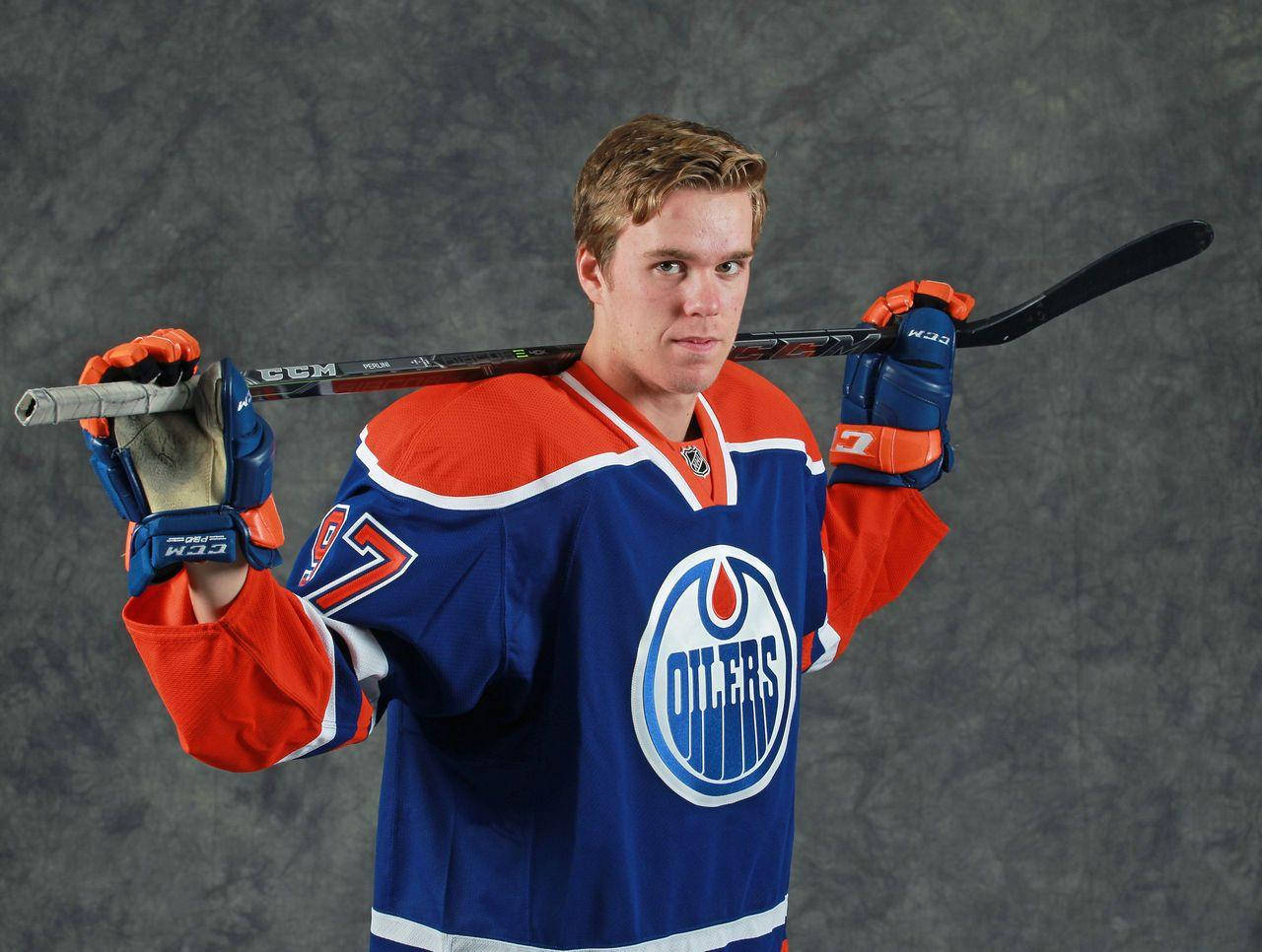 A Canadian Ice Hockey Player Connor Mcdavid Wallpaper