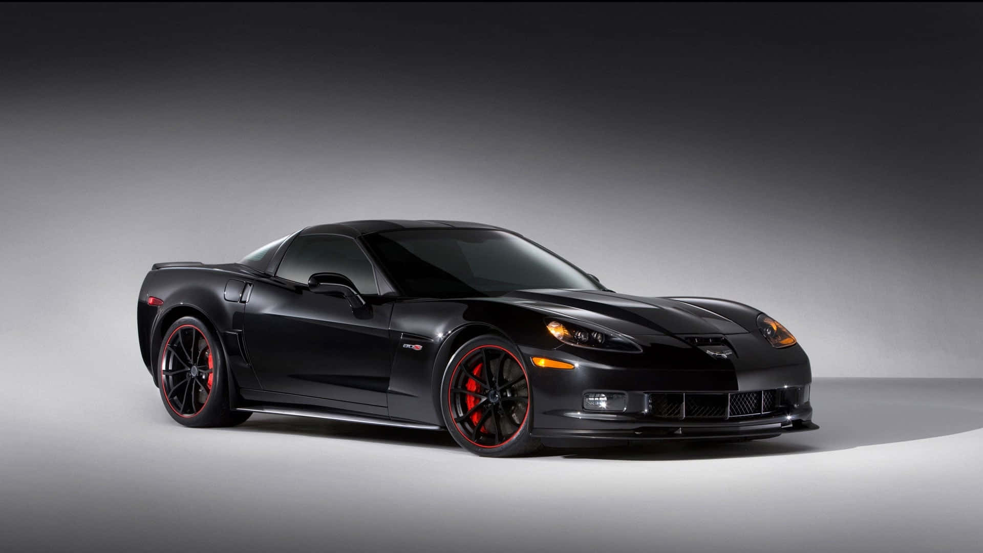 A Captivating Chevrolet Corvette C6 In Red Wallpaper