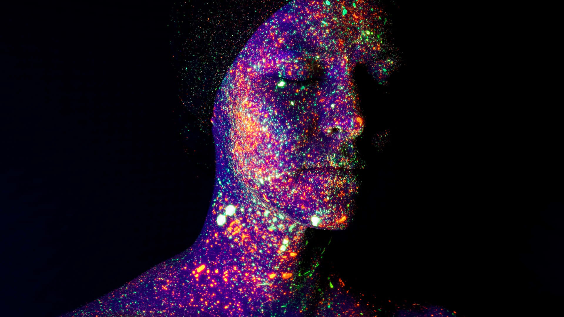 A Captivating Display Of Neon Makeup Glowing Under Black Light. Wallpaper
