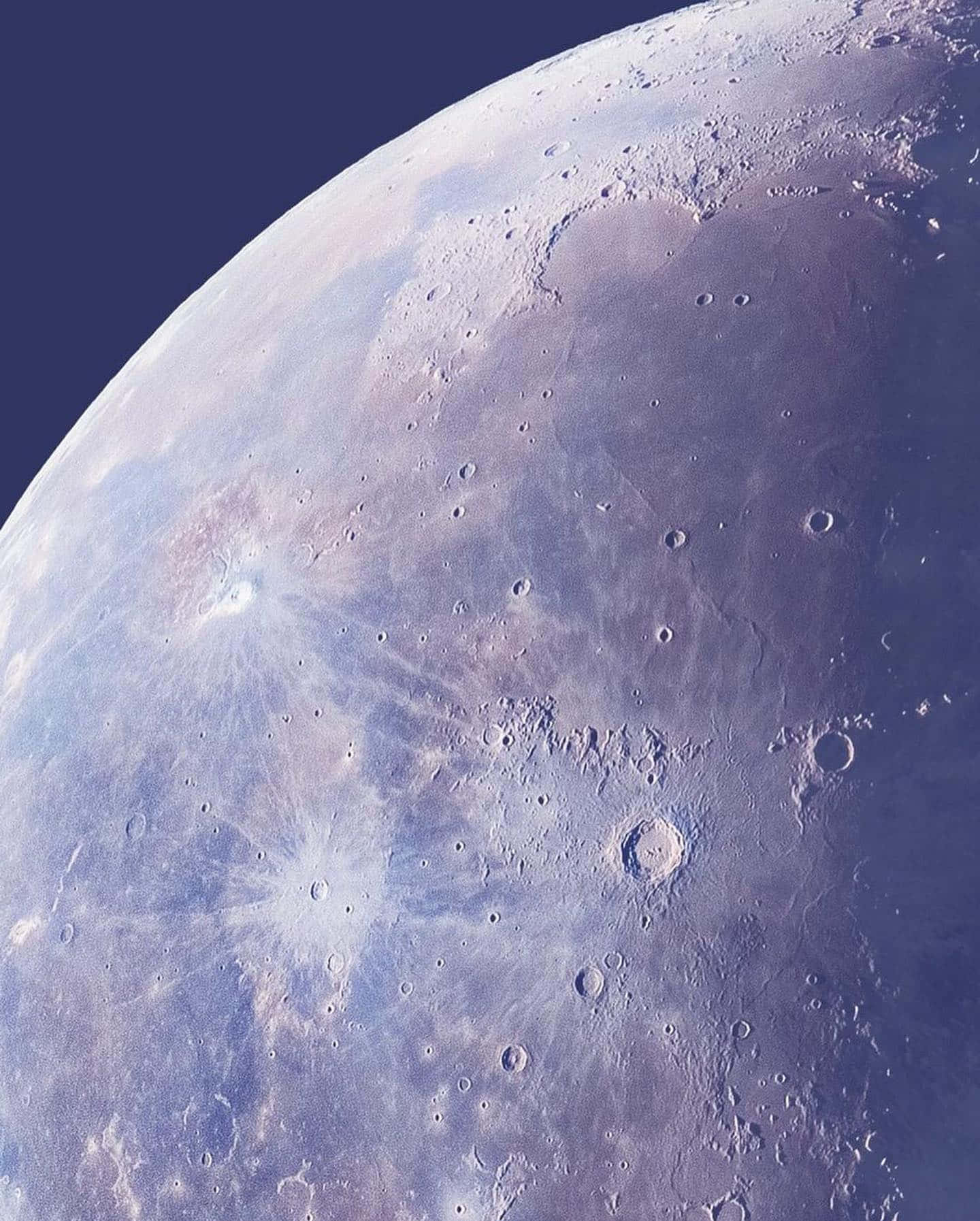 A Close-up View Of The Moon's Surface Wallpaper