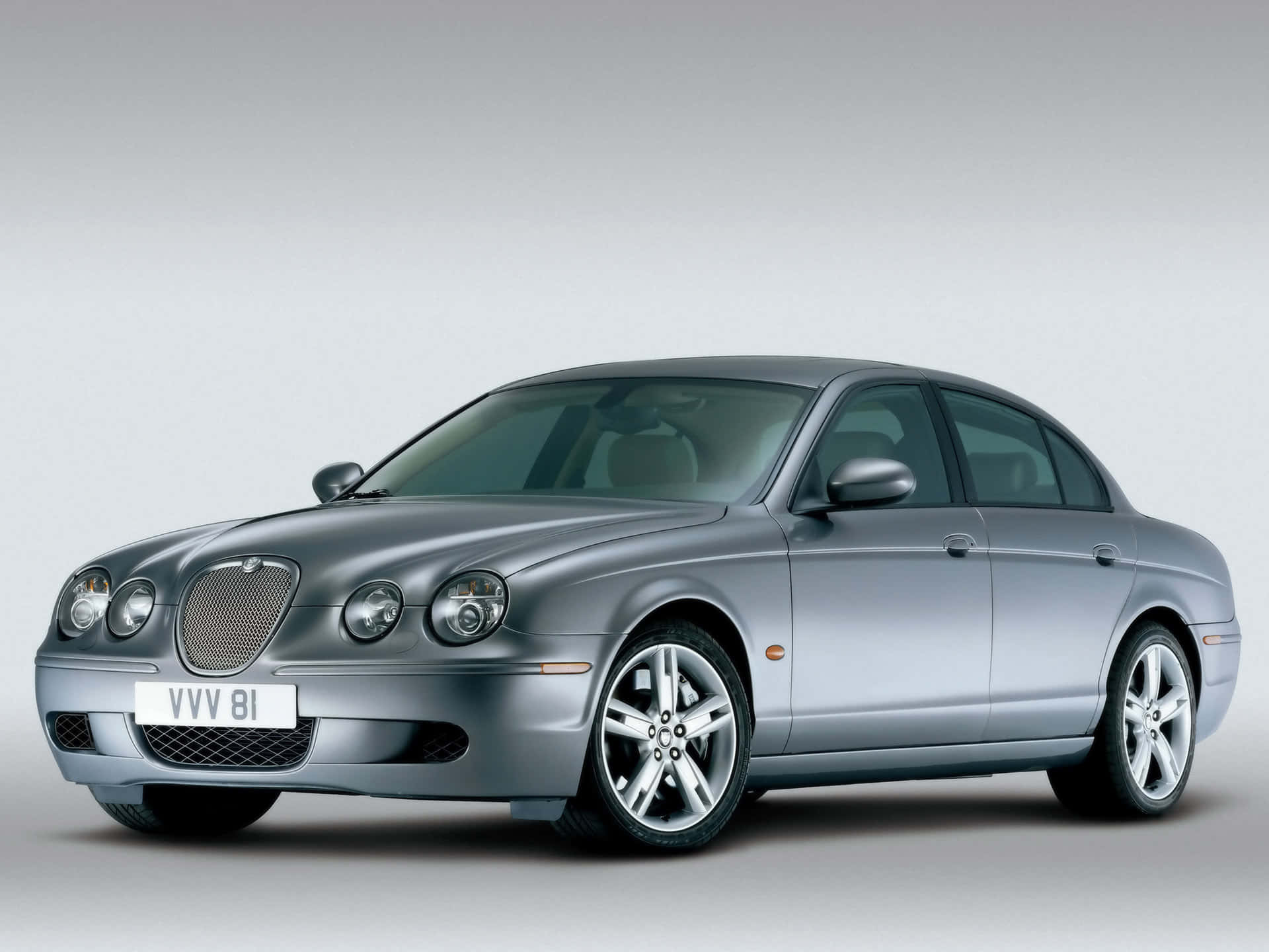 A Gleaming Jaguar S-type In Midnight Blue Wallpaper