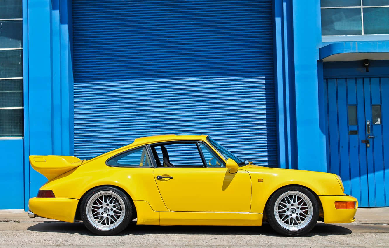 A Gleaming Porsche 964 In Iconic Style Wallpaper