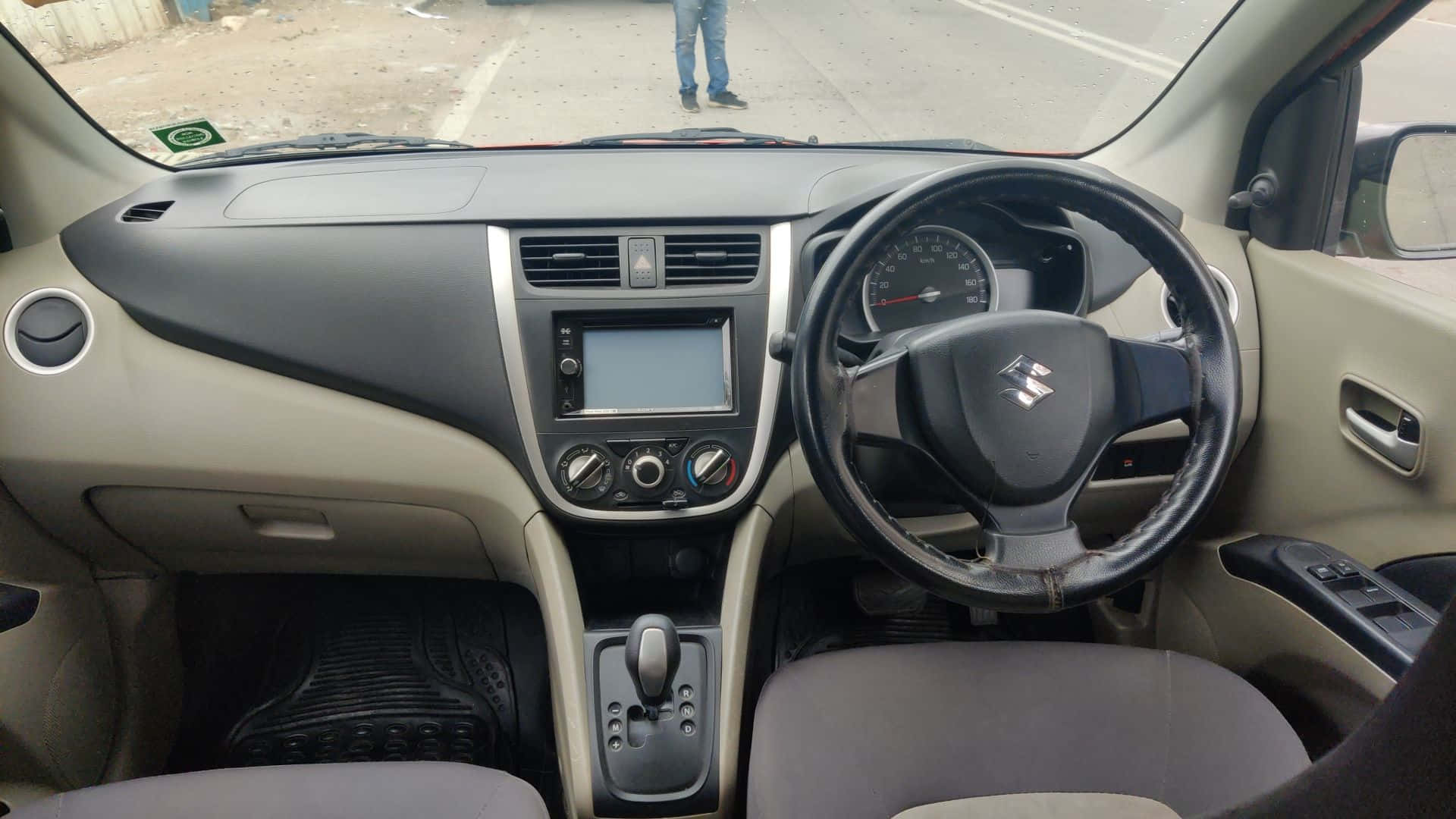 A Gleaming Suzuki Celerio Dominating The Open Road Wallpaper