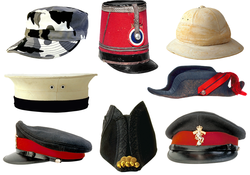 A Group Of Hats On A Black Background PNG
