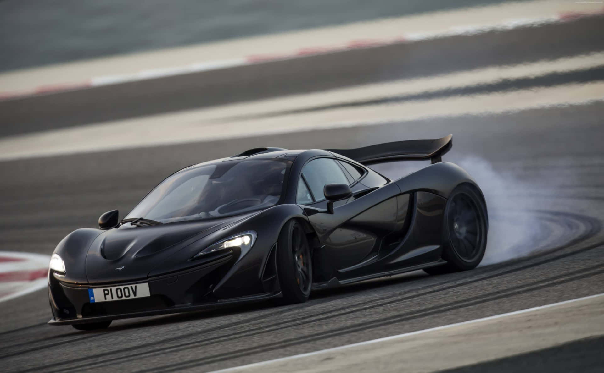 A High Definition Image Of The Sleek Mclaren P1 Supercar, Showcasing Speed And Design Excellence. Wallpaper