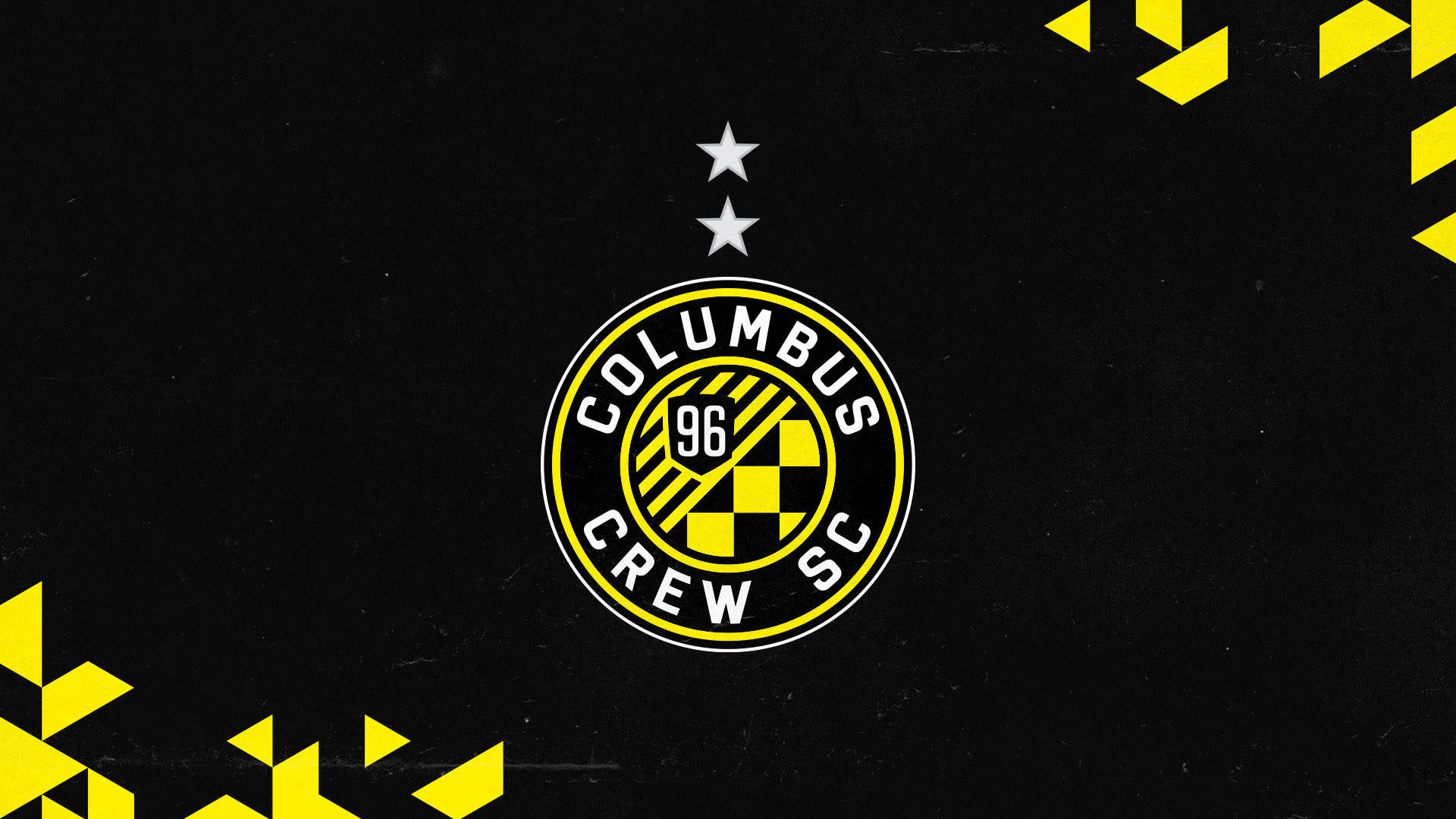 A Logo Of Columbus Crew At The Center Background