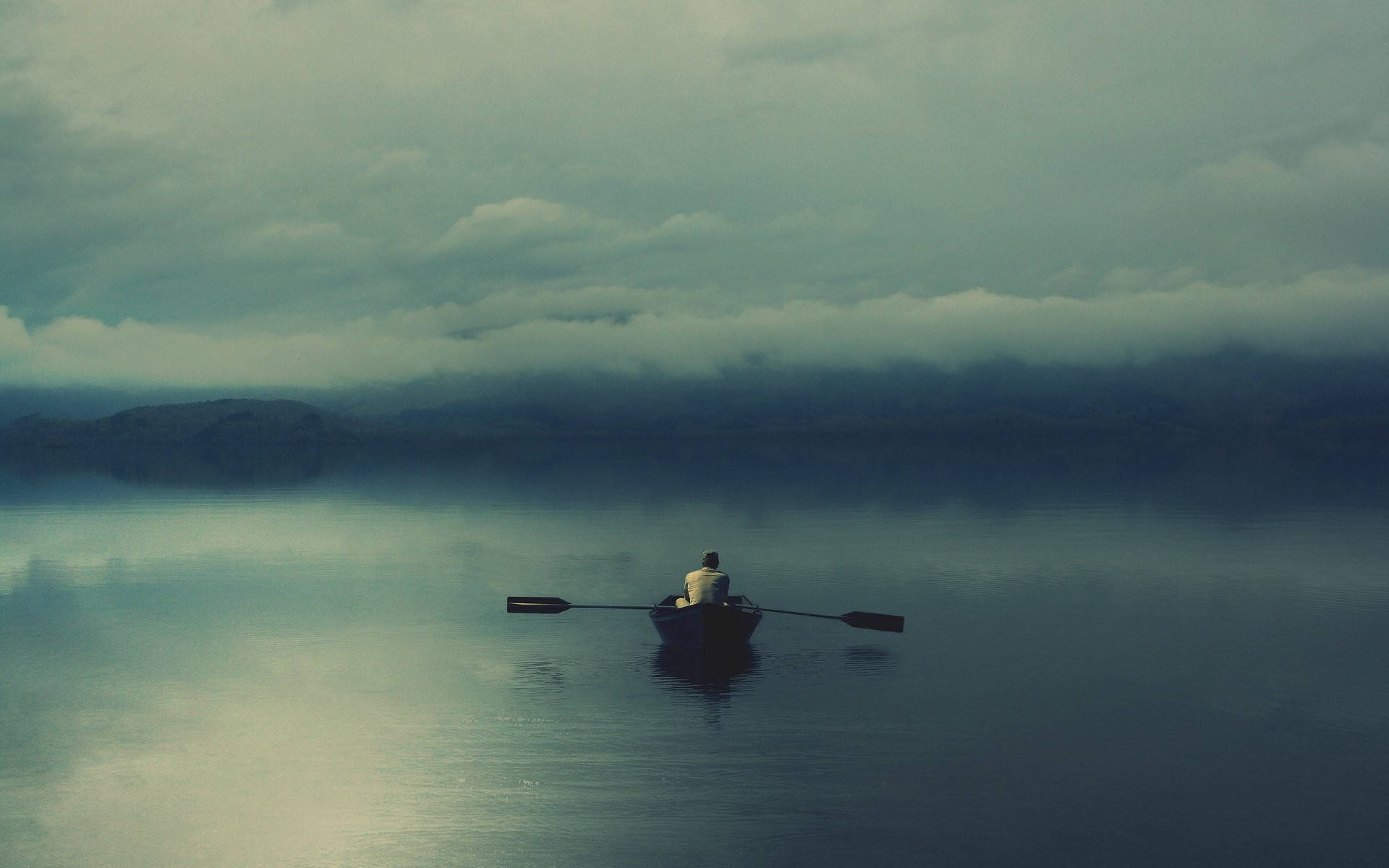 A Lonely Depressed Man On Boat Wallpaper