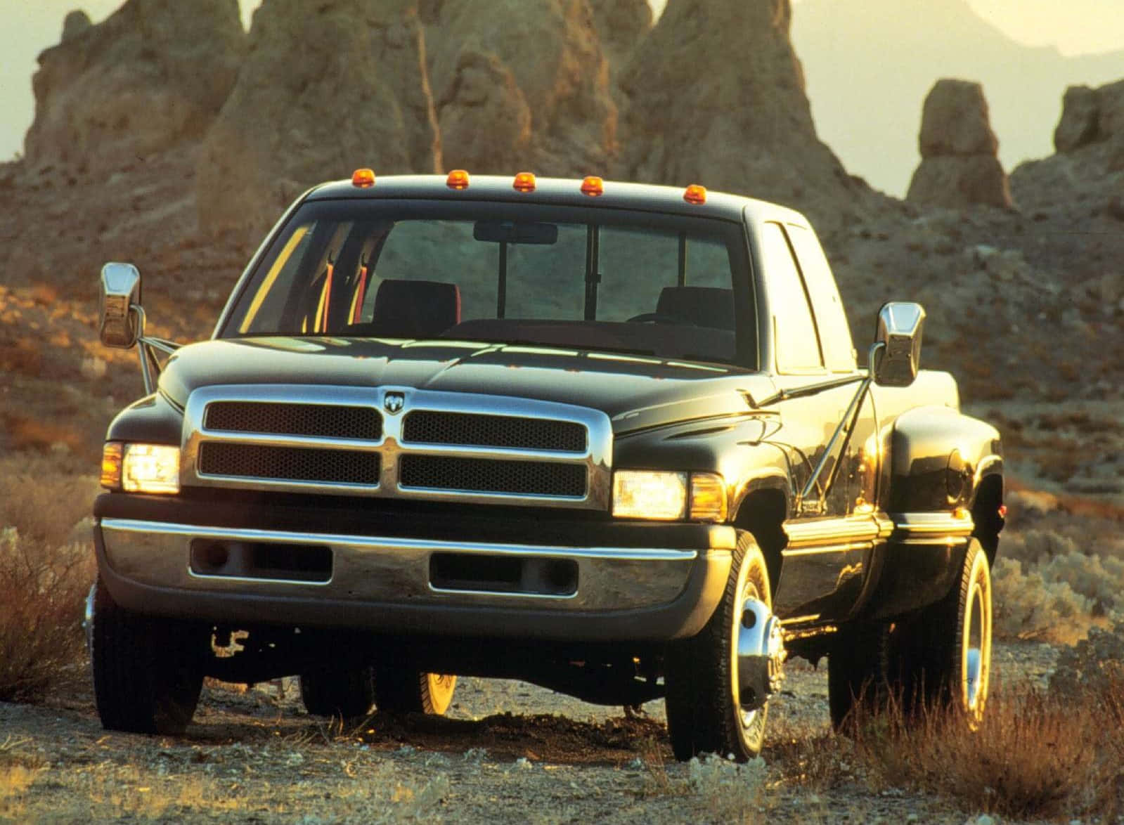 "a Majestic Dodge Ram Gliding On A Highway" Wallpaper