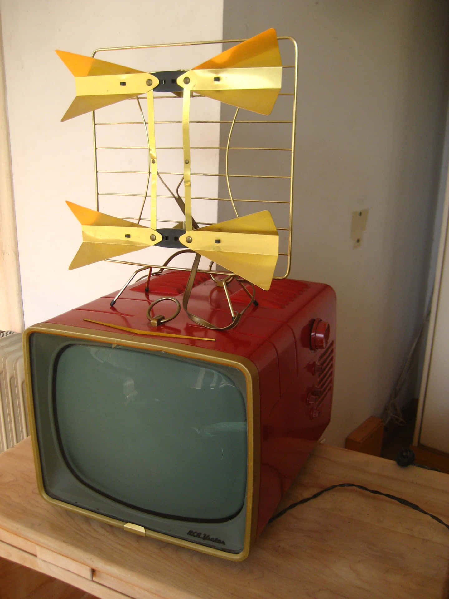 A Modern Flat Screen Television With Multi-colored Background