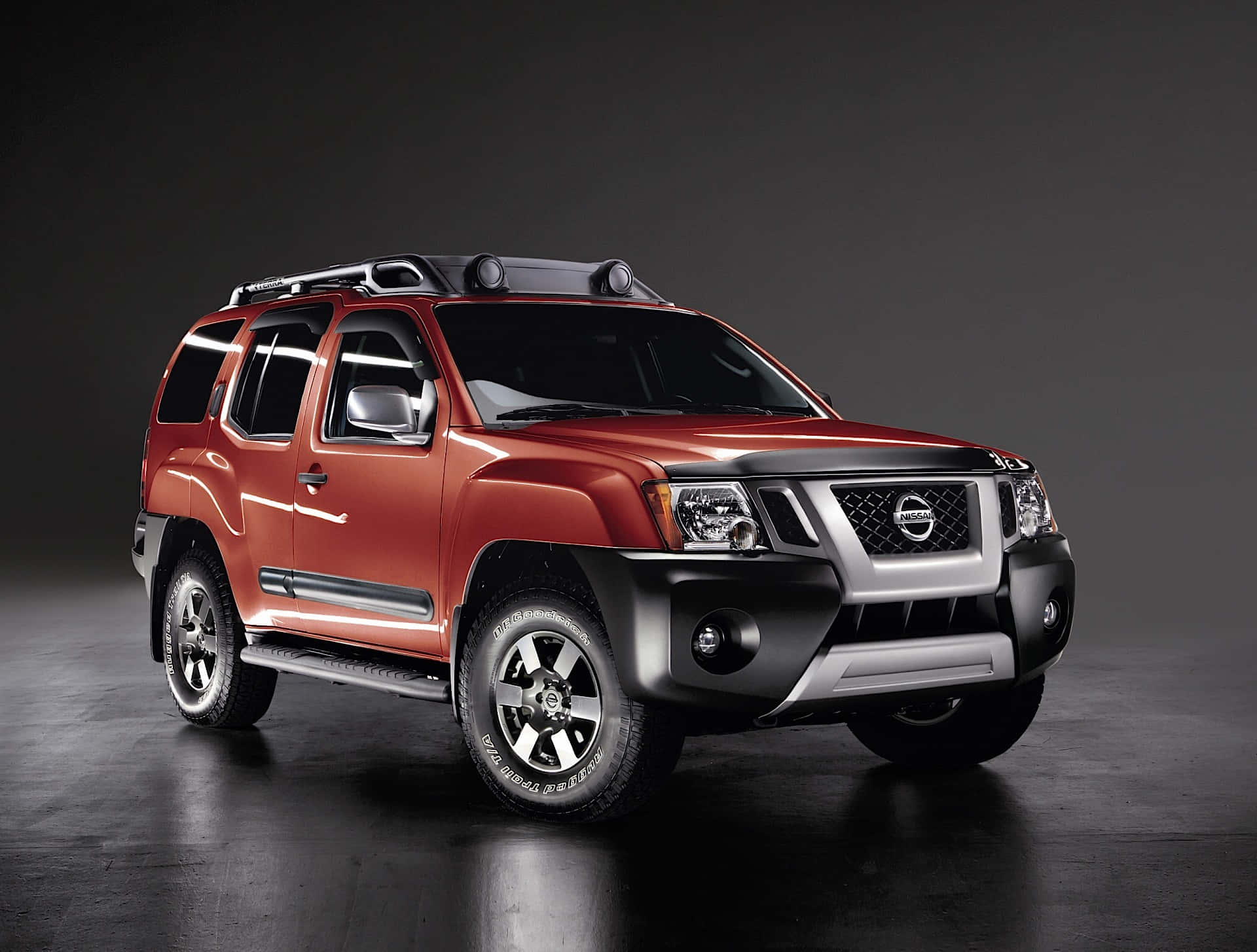 A Nissan Xterra Demonstrating Off-road Prowess In A Scenic Terrain. Wallpaper