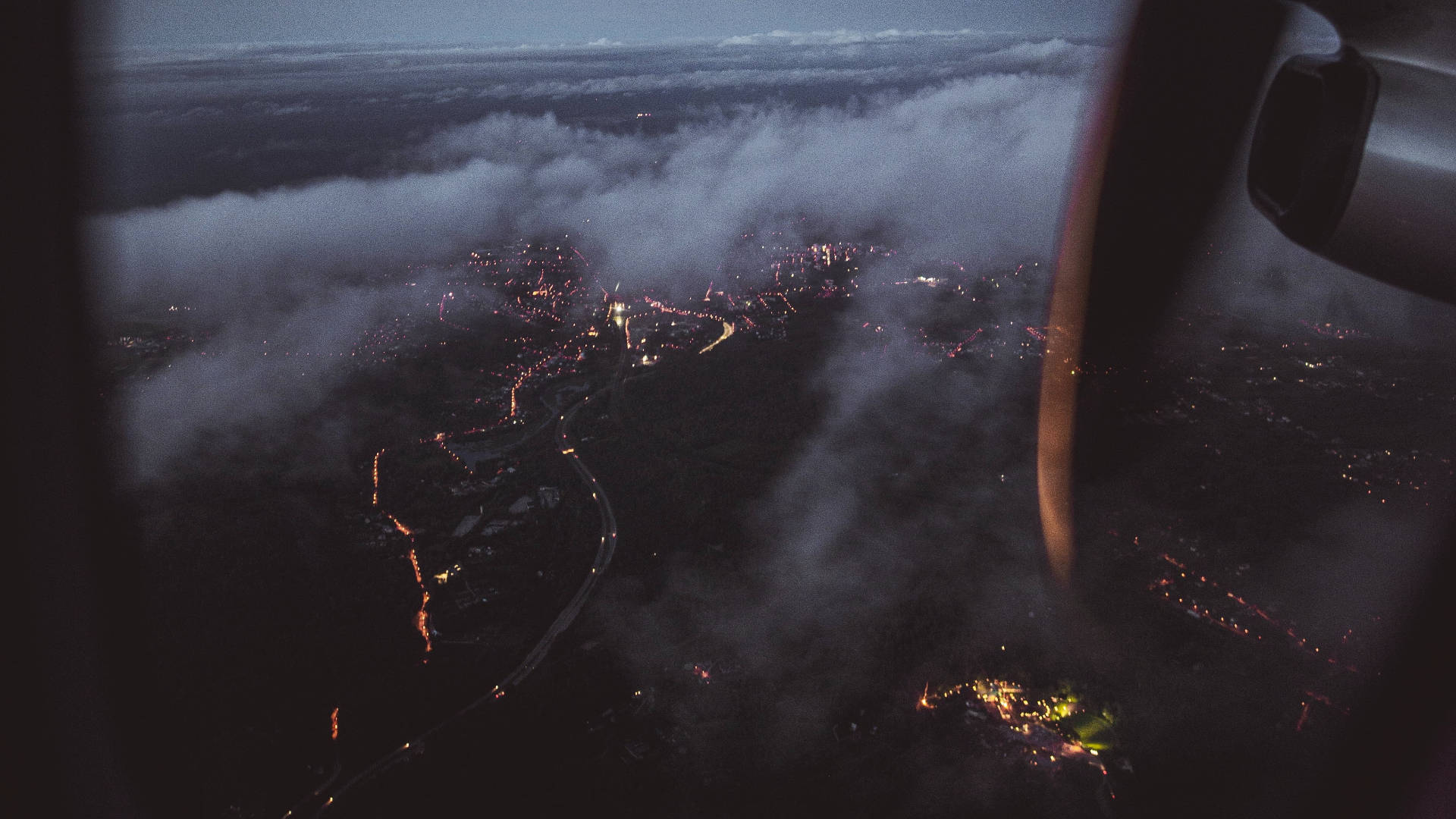 A Picturesque City View From A Plane Window Wallpaper