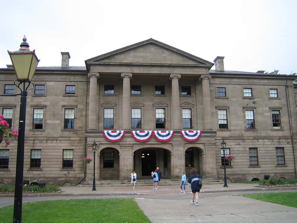 Et Pittoresk Bilde Av Charlottetown Havn Ved Solnedgang Bakgrunnsbildet