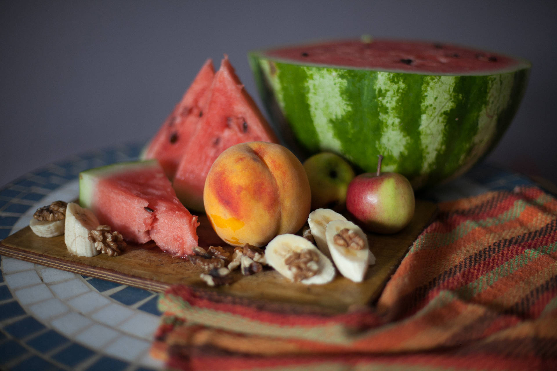 A Platter Of Fruits On Wooden Tray Wallpaper