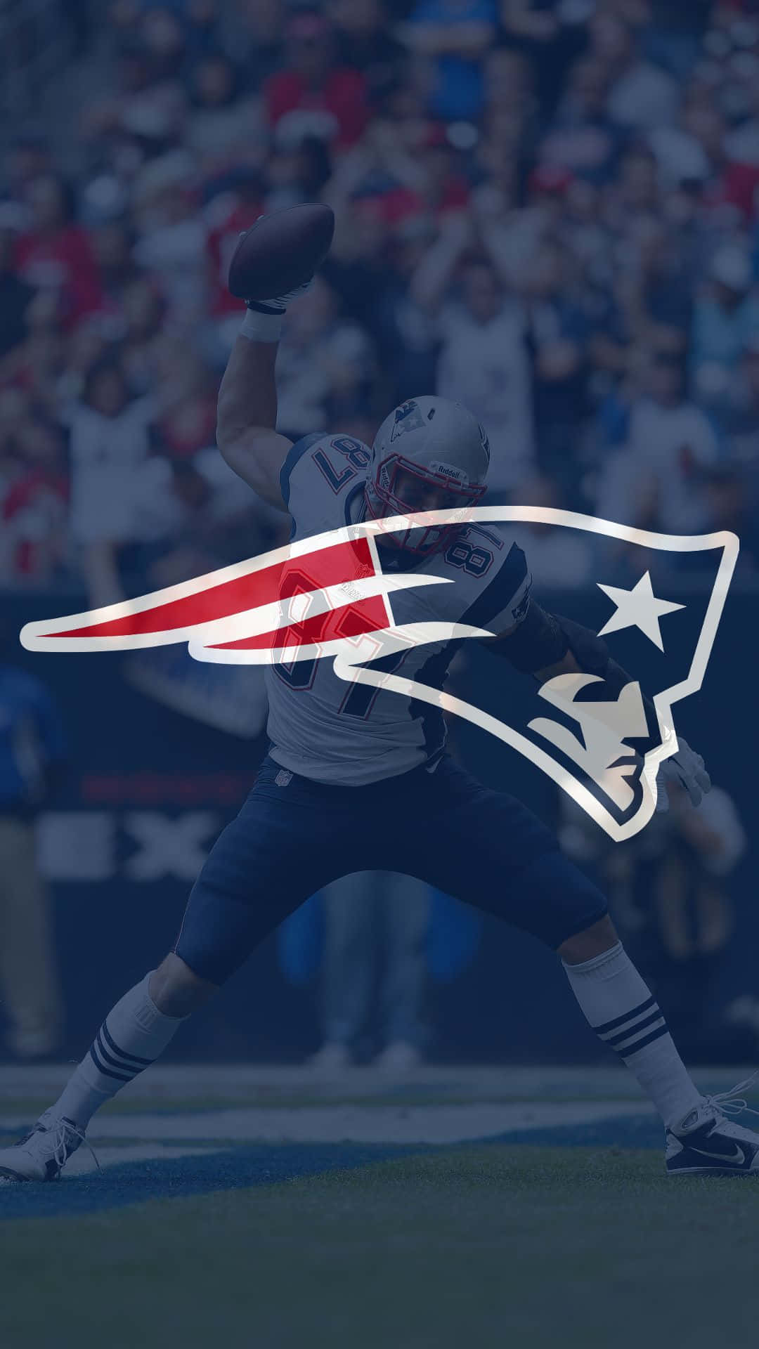 A Powerful Display Of New England Patriots Pride With The Team Logo Highlighted Against An Abstract Background.
