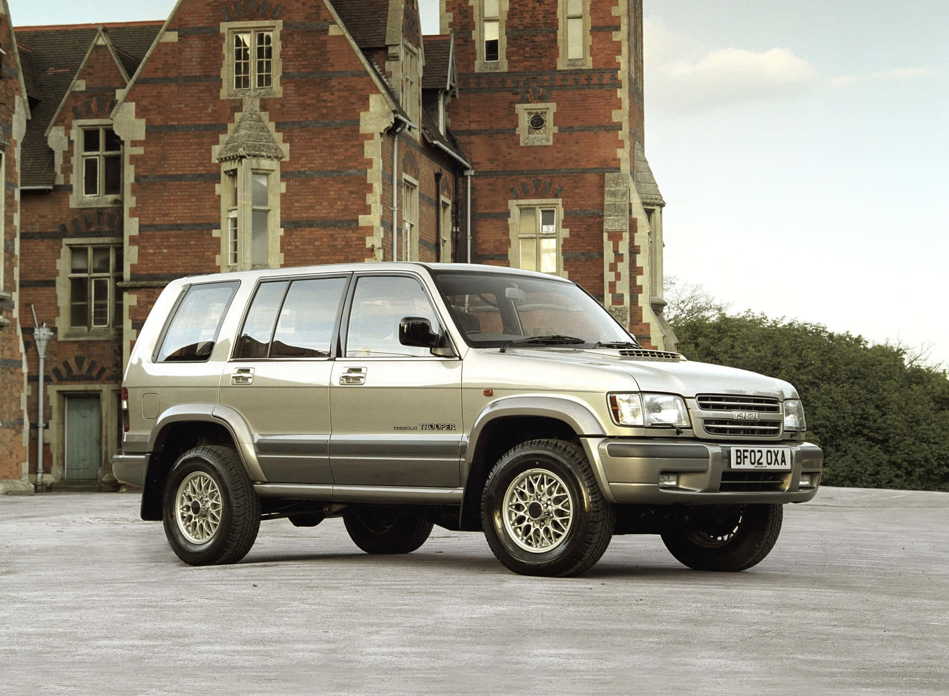 A Ruggedly Designed Isuzu Trooper On Off-road Adventure Wallpaper