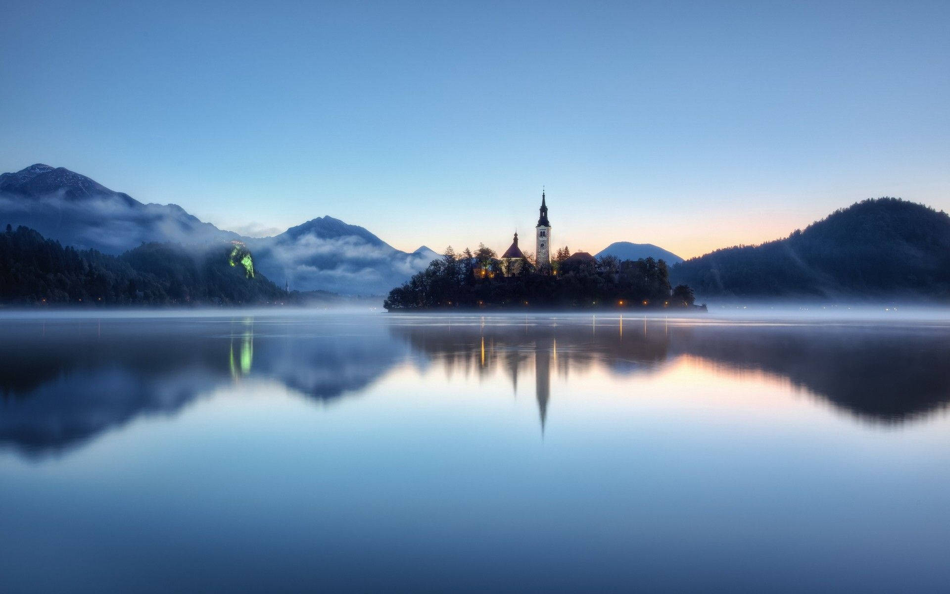 A Serene View Of Lake Bled In Slovenia Wallpaper