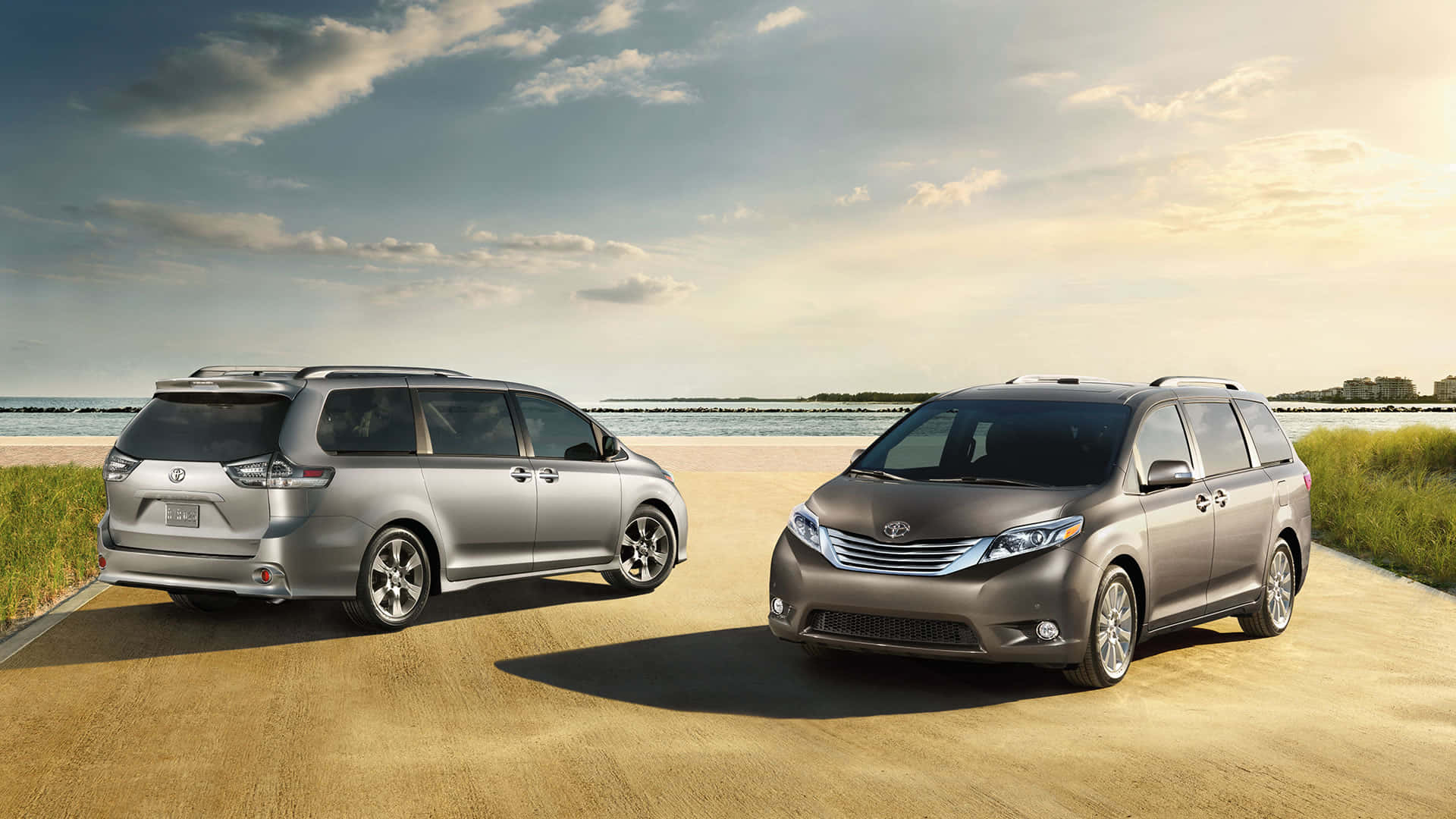 A Shiny Toyota Sienna On An Open Road Wallpaper