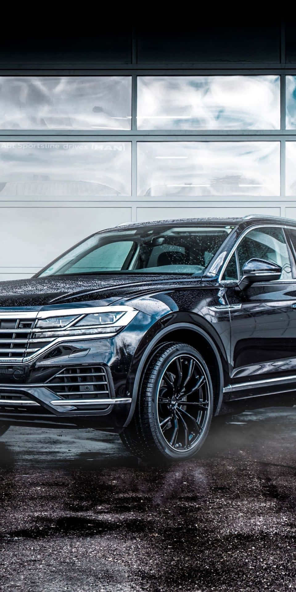 A Sleek And Stylish Volkswagen Touareg In Motion Wallpaper