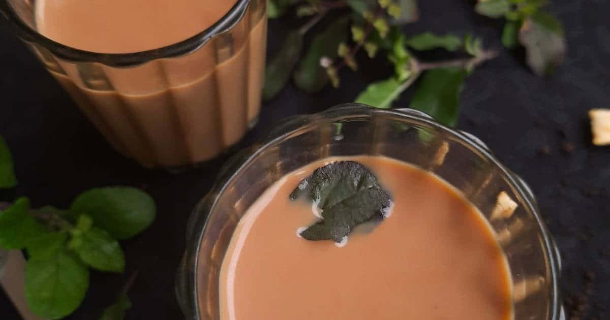 A Steaming Cup Of Chai Tea From A Traditional Teapot Wallpaper