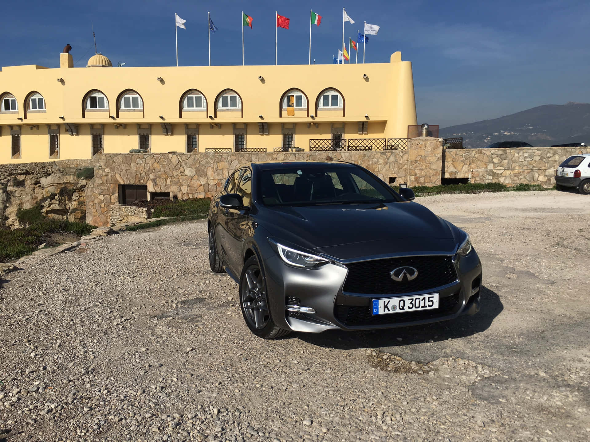 A Striking Infiniti Qx30 In Its Full Glory Wallpaper