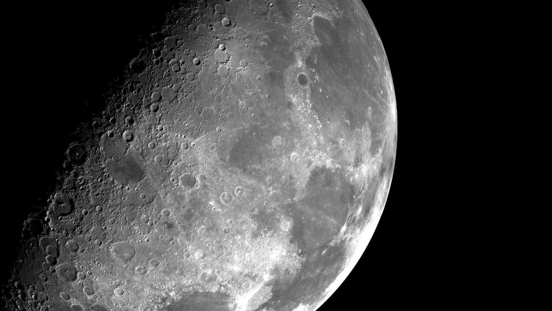A Stunning High-resolution Image Of The Moon's Surface Wallpaper
