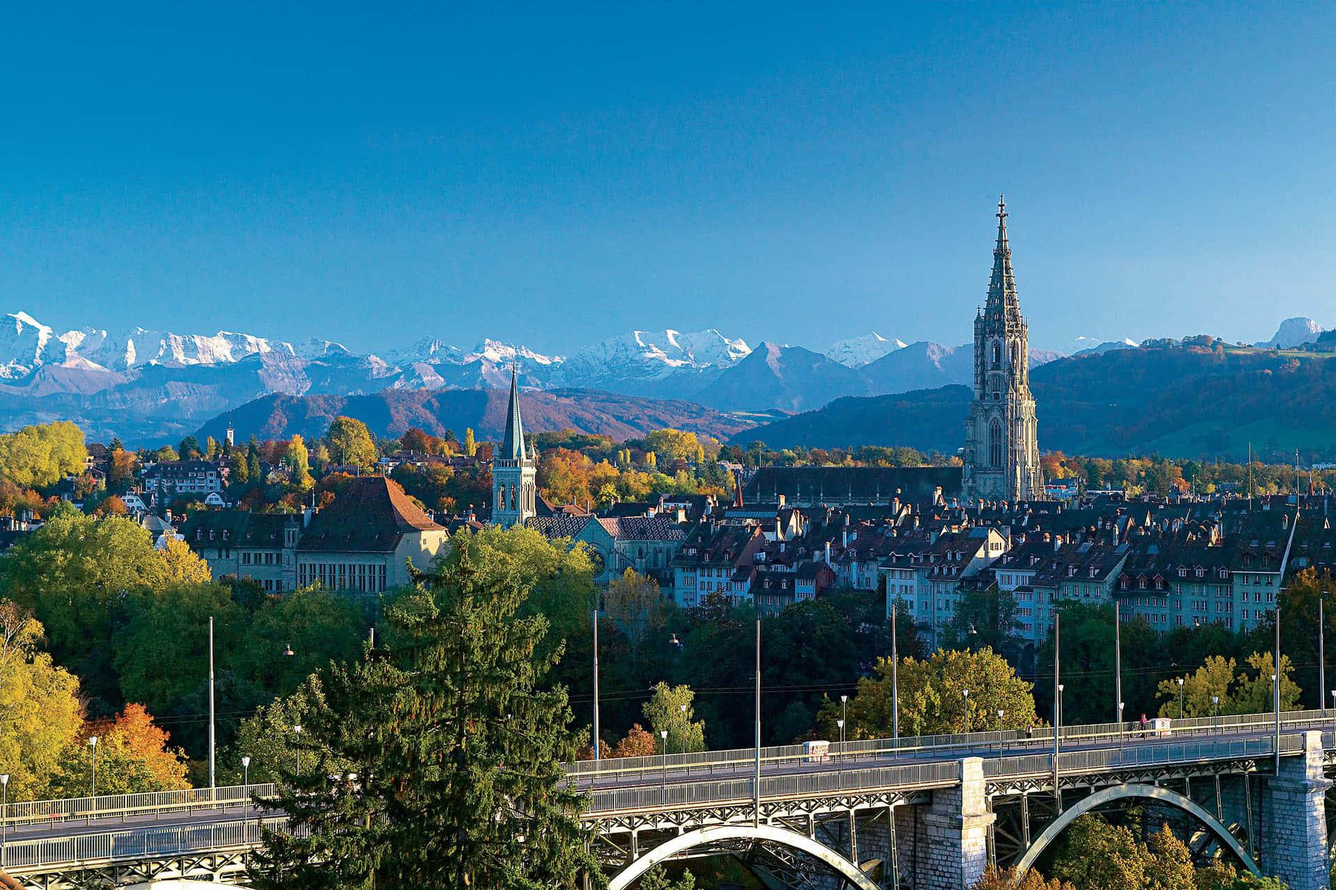 A Stunning Sunset Over The Historic Cityscape Of Bern, Switzerland Wallpaper