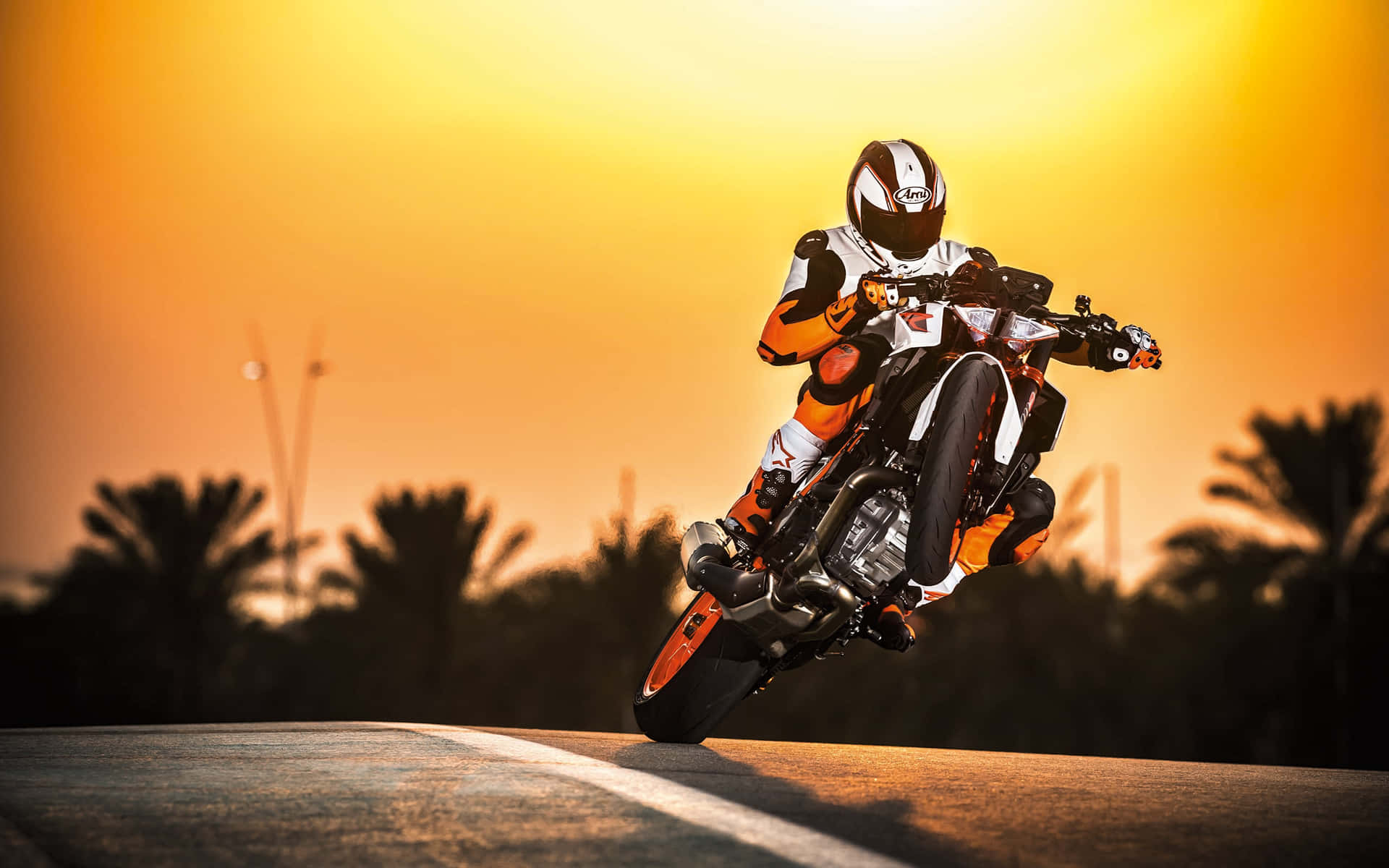 A Thrilling Ktm Adventure Motorcycle On An Open Road. Wallpaper