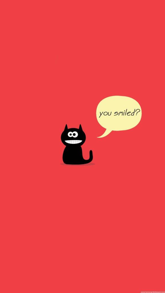 Einewinzige Schwarze Katze Mit Einem Süßen Lächeln Wallpaper