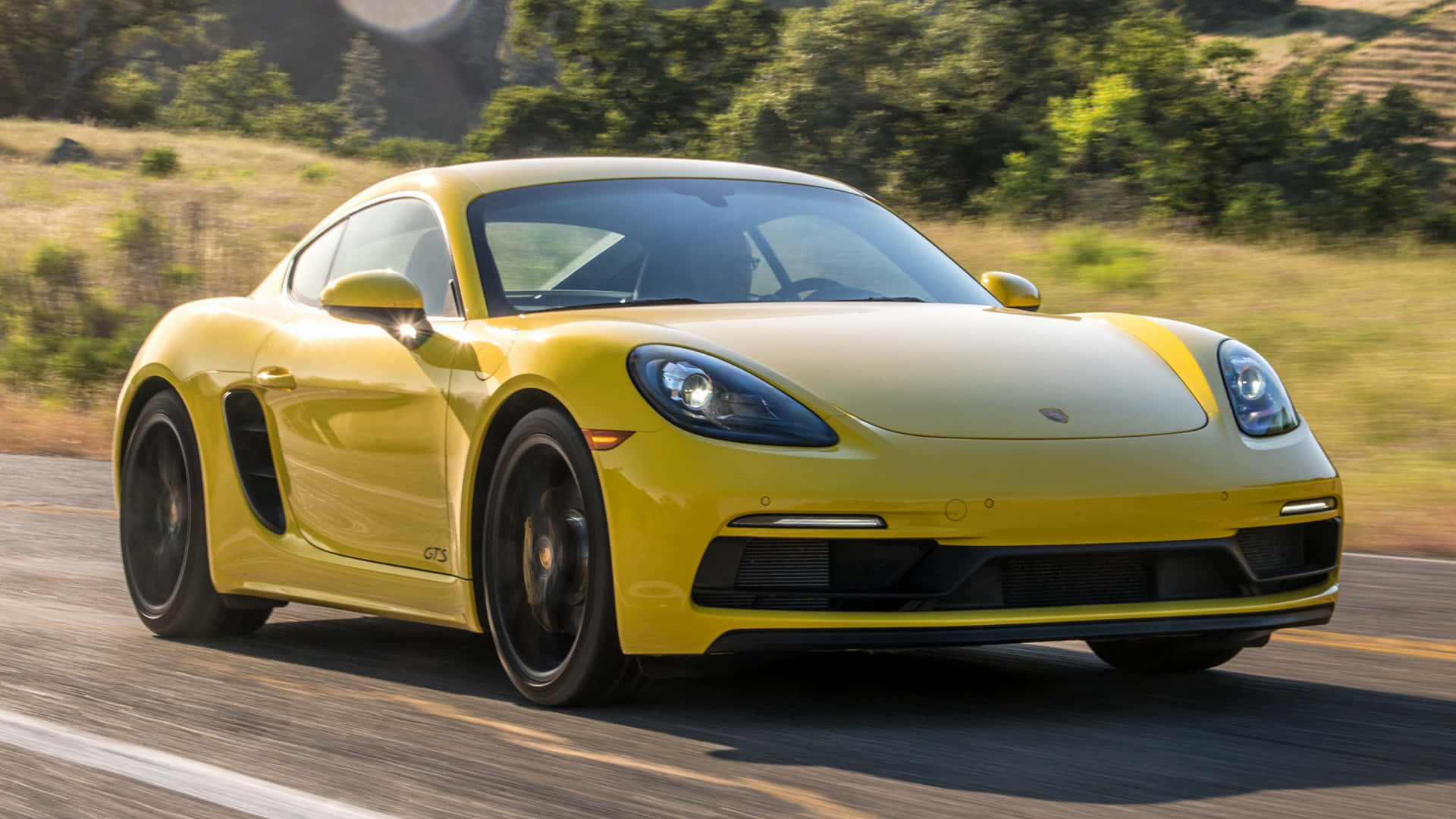 A Uniquely Designed Porsche 718 Cayman Demonstrating Its Unrivaled Beauty And Power Wallpaper