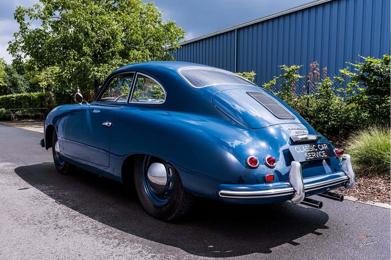 A Vintage Porsche 356 In Pristine Condition. Wallpaper