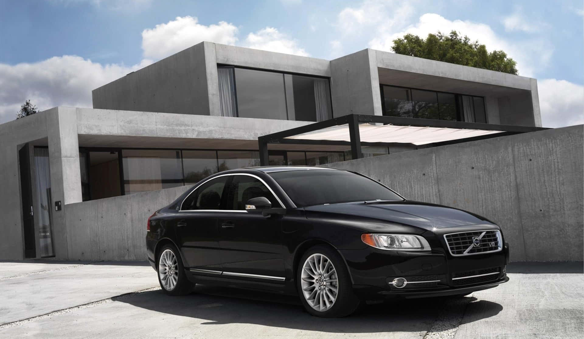 A Volvo S80 Luxury Sedan Showcased In A Spacious Outdoor Setting Wallpaper