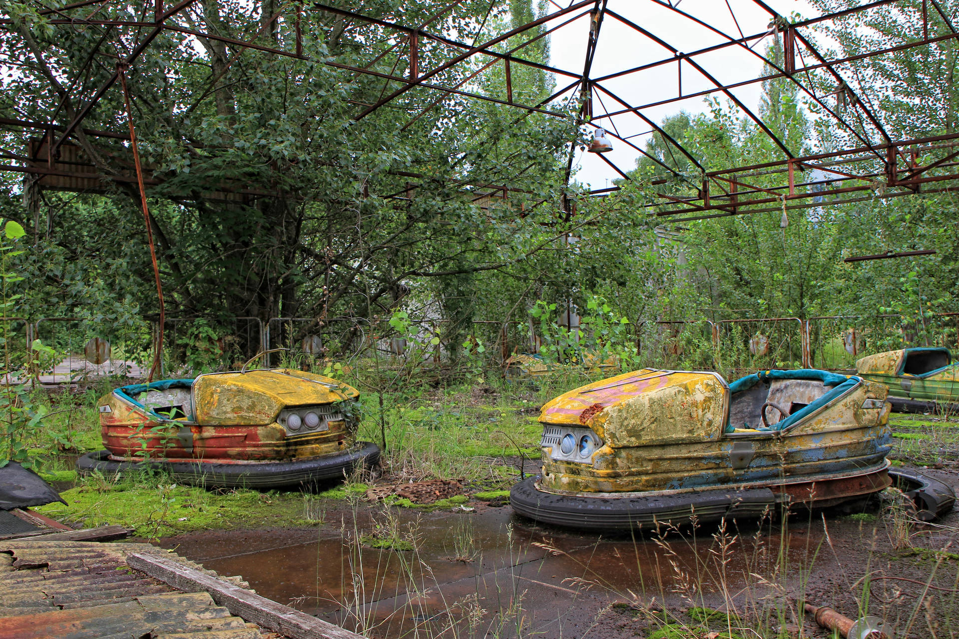 Eerie Echoes of an Abandoned Theme Park Ride Wallpaper