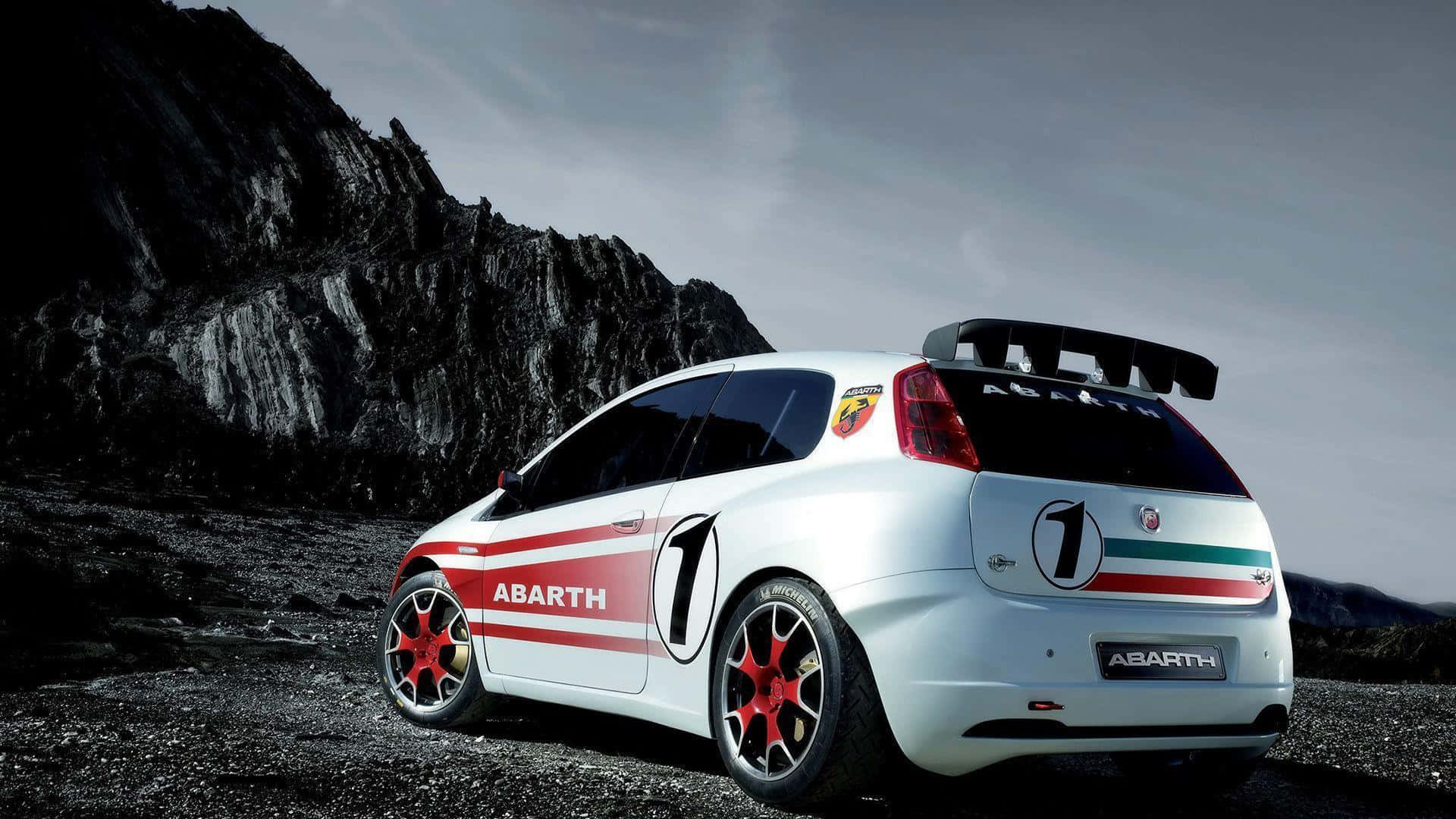 A stunning red Abarth car in all its glory Wallpaper