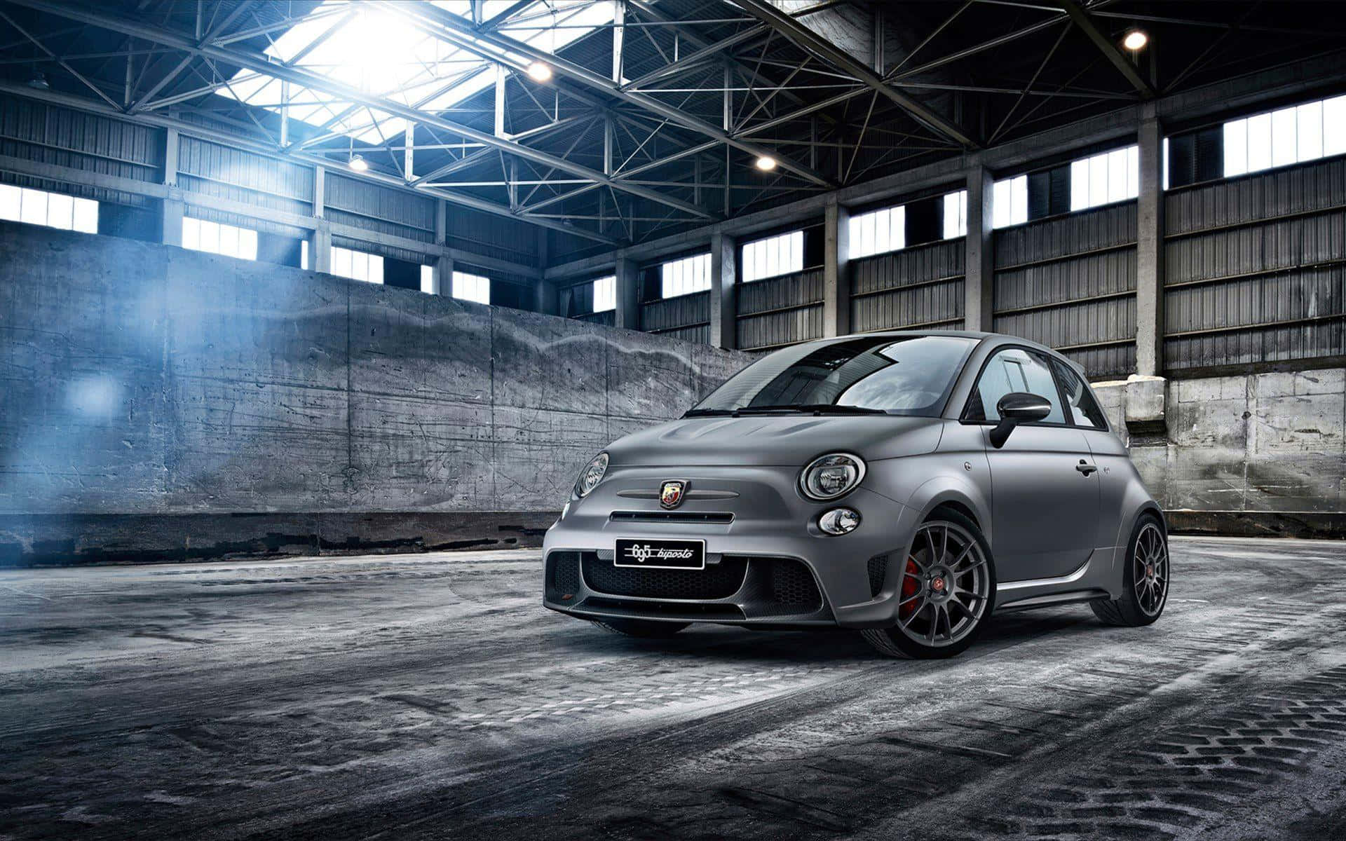 Sleek and Powerful Abarth on the Road Wallpaper