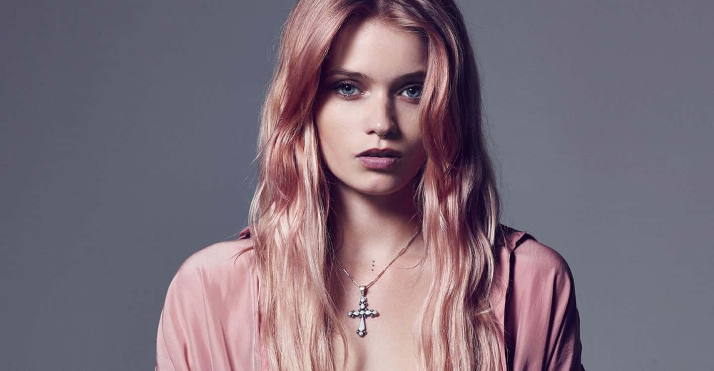 Abbey Lee Kershaw Posing Gracefully In A High-fashion Photoshoot Wallpaper
